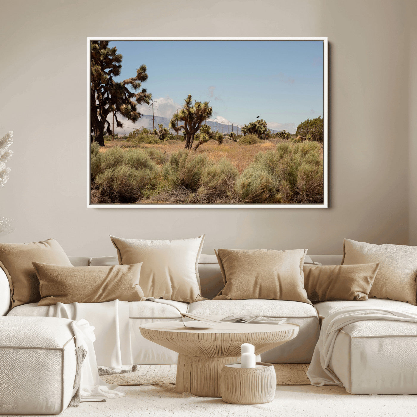 Scenic desert landscape with Joshua trees, dry grass, and distant mountains under a clear blue sky, perfect for southwestern and rustic decor.