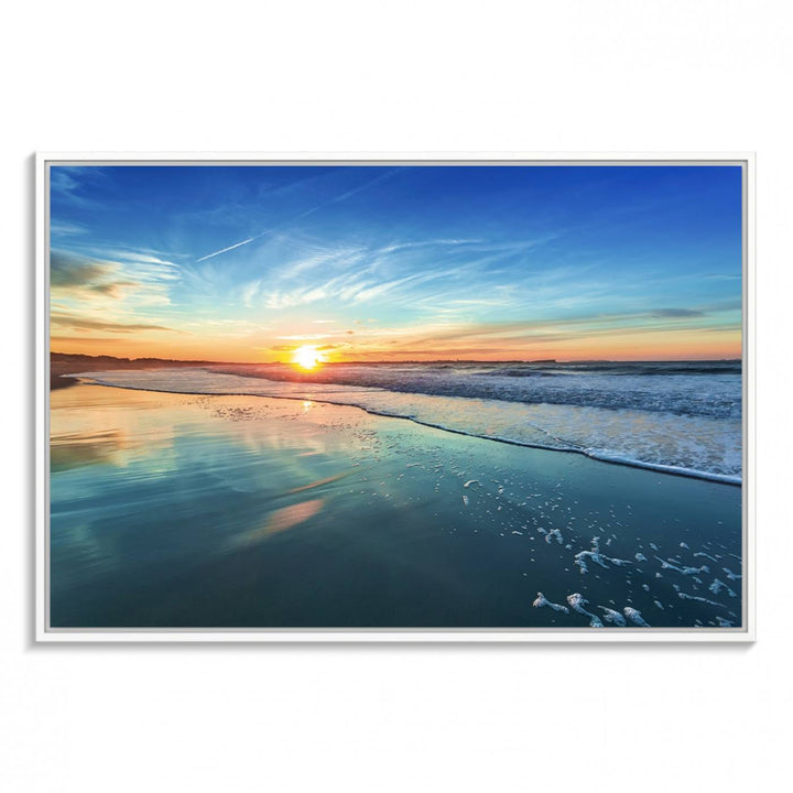 The Blue Sky and Beach Wall Art Canvas Print features a vibrant orange sky reflecting on wet sand.