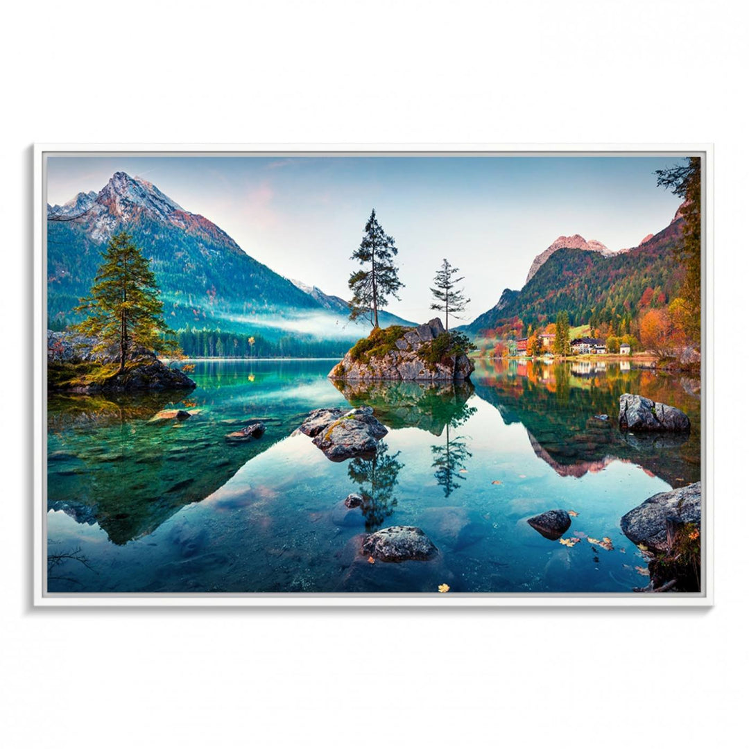 The 3-panel wall art showcases a serene mountain lake with rocky islands and trees, creating an ideal focal point for dining rooms or offices.