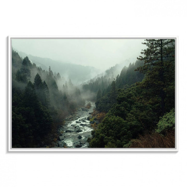 The Misty Forest Wall Art features a serene landscape with a misty river and evergreens, ideal for enhancing the ambiance of any living room or cabin.