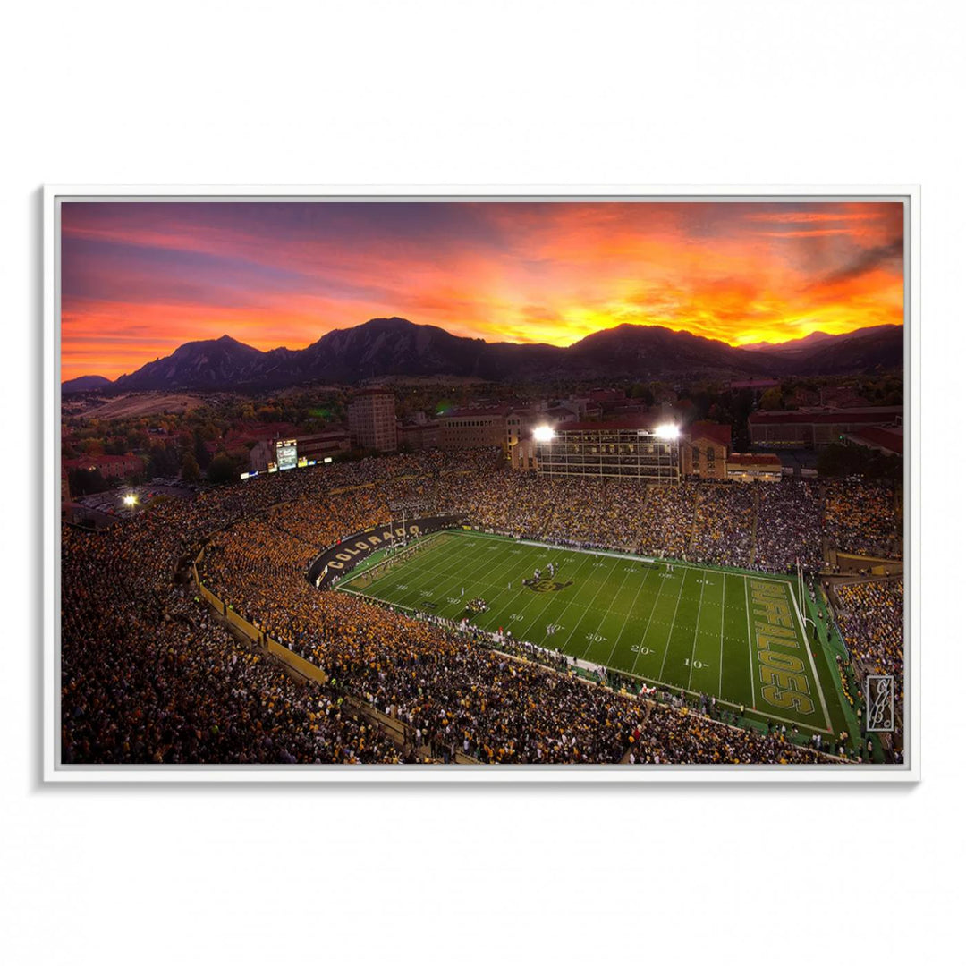 A vibrant mountain sunset at Folsom Field, home of the University of Colorado Football team, is captured in this stunning wall art canvas print.