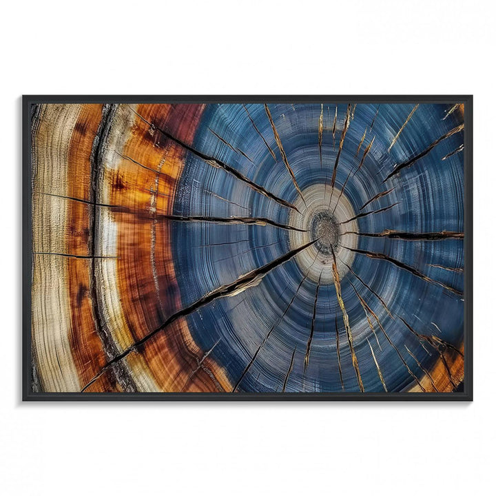 Close-up of blue, brown, and orange wood grain rings on the Abstract Tree Rings Canvas Wall Art Print.