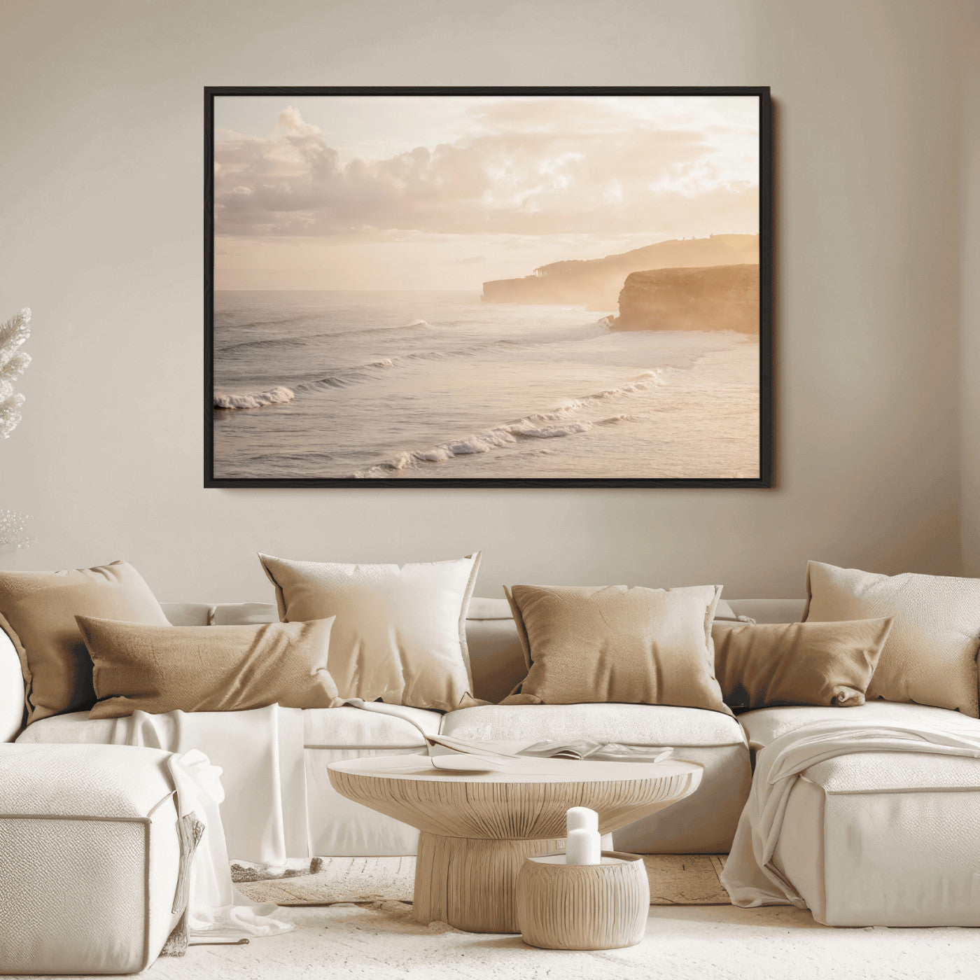 Golden hour seascape with misty cliffs and gentle waves rolling towards the shore, capturing a tranquil and warm coastal atmosphere.