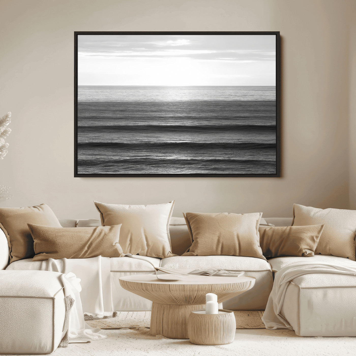 Minimalist black and white ocean view with layered waves reflecting sunlight, evoking a sense of calm and coastal serenity.