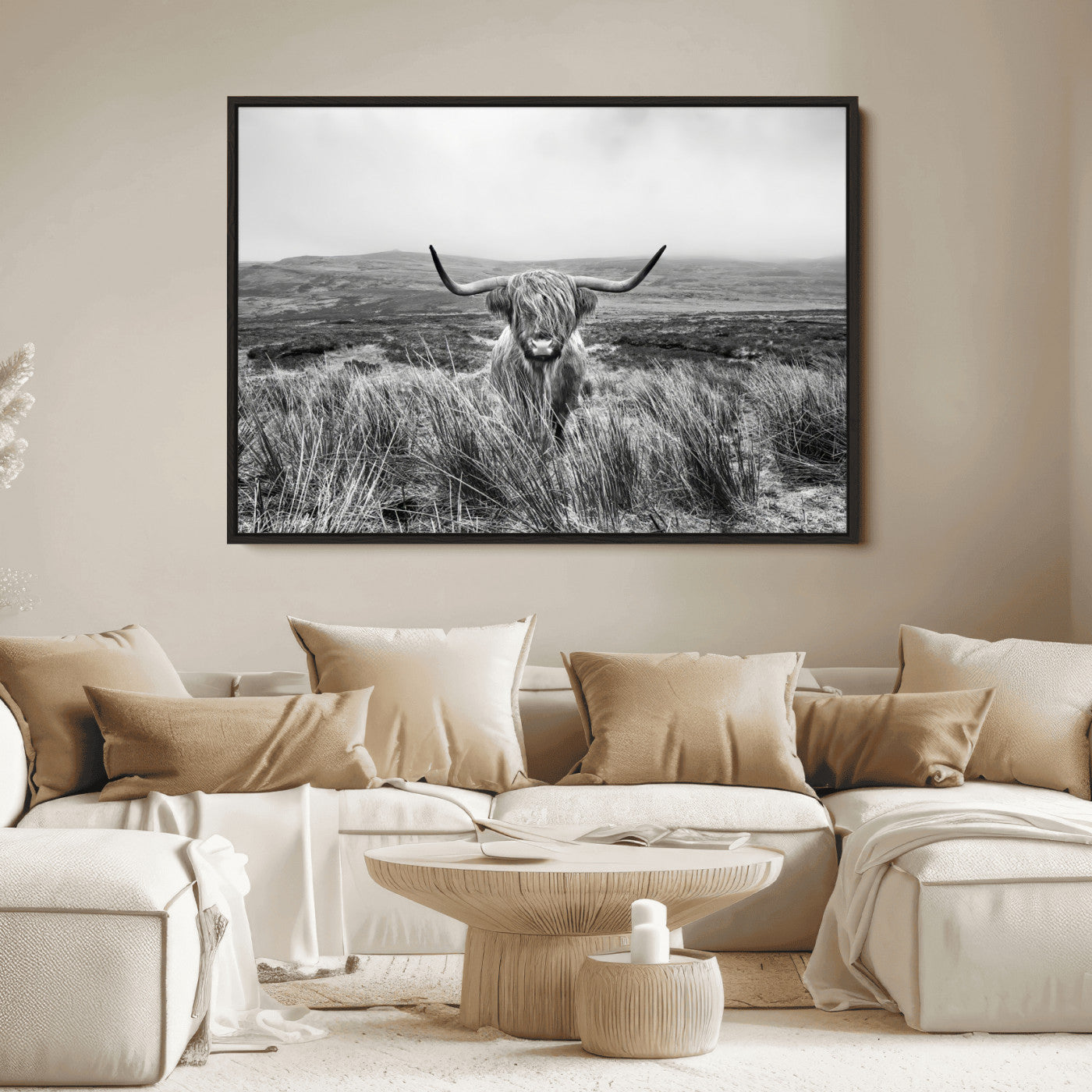 A black and white portrait of a Highland cow in a foggy Scottish countryside, capturing a rustic aesthetic and tranquil farm escape.