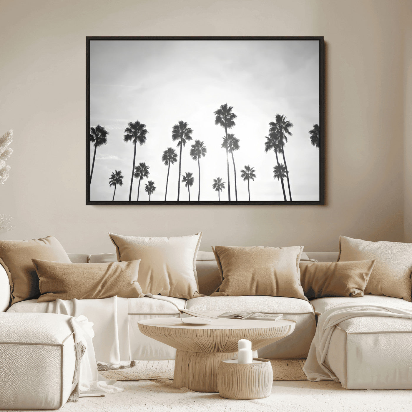 A black and white minimalist scene featuring tall palm trees silhouetted against a bright sky, creating a dreamy and timeless tropical aesthetic.