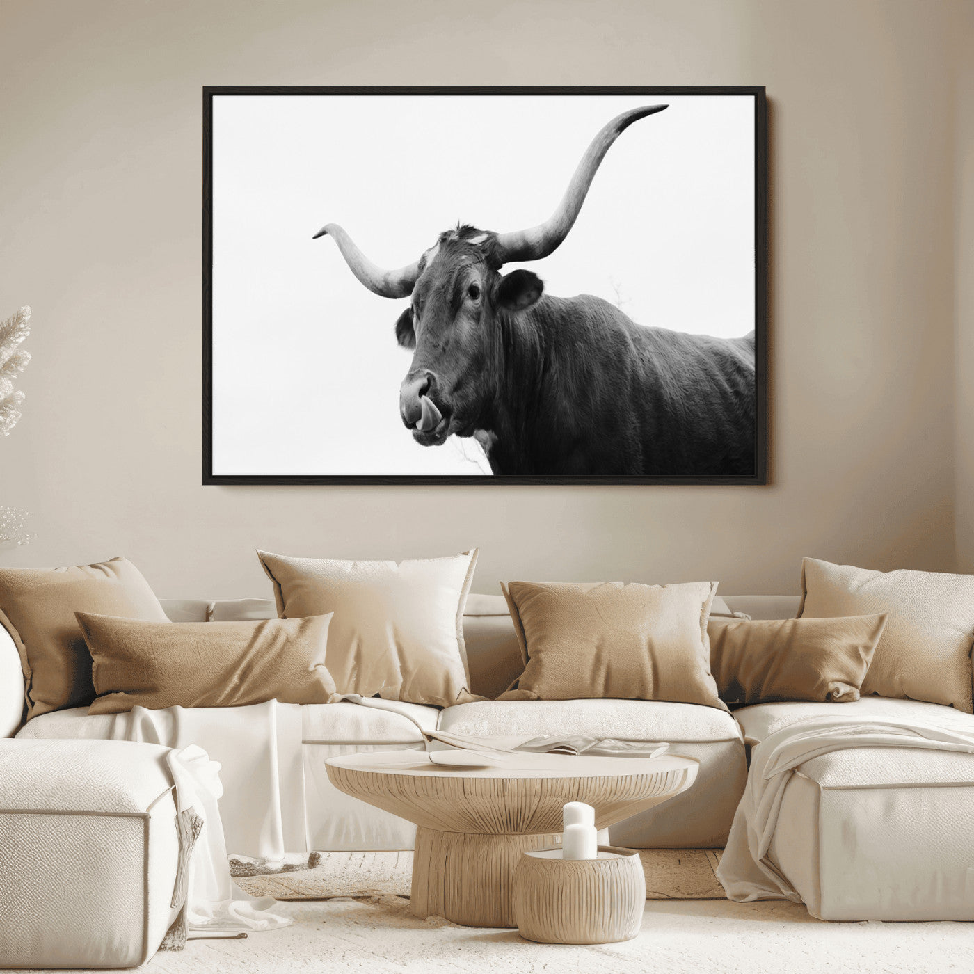 Black and white photo of a Texas Longhorn cow with curved horns, ideal for rustic, western or minimalist style home decor.