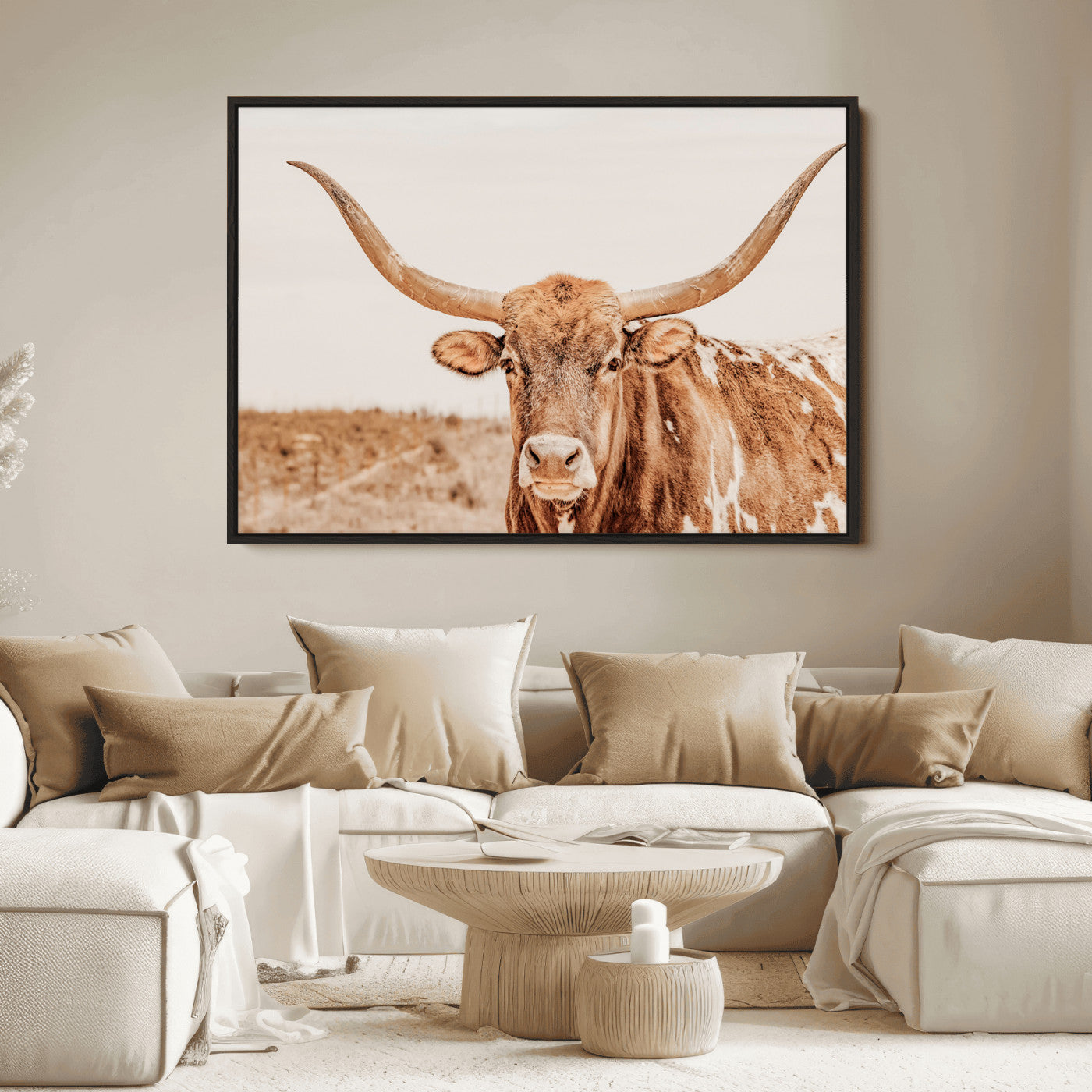 Sepia-toned Texas Longhorn facing forward in a dry field, perfect for rustic farmhouse or western-themed neutral home decor.