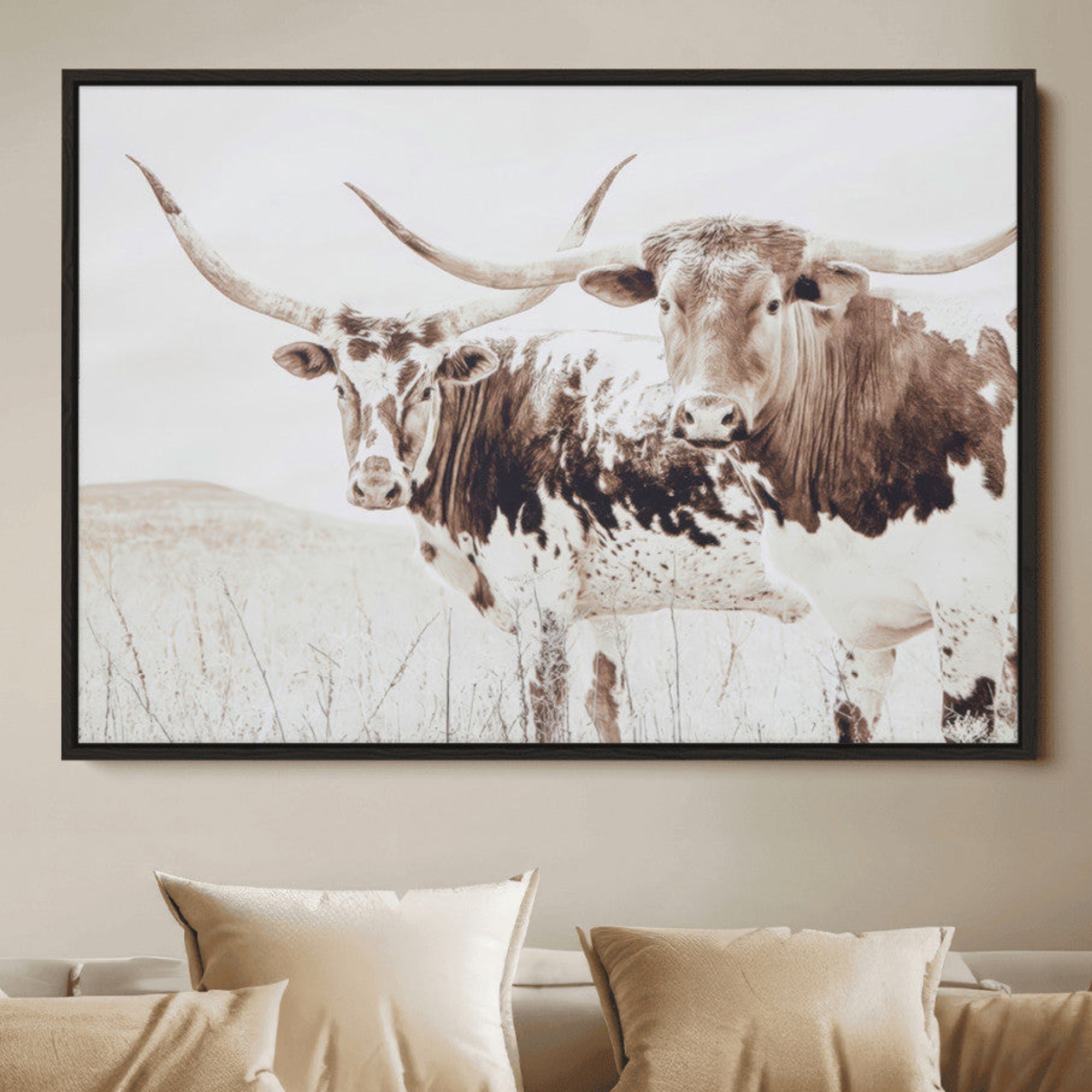Two longhorn cows standing in a sepia-toned pasture with soft light, ideal for rustic or farmhouse-themed neutral wall decor.
