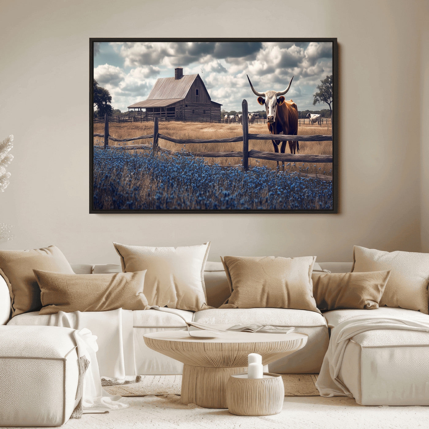 Framed canvas art of a Texas Longhorn cow near a rustic barn and bluebonnet field, ideal for country-style or farmhouse wall decor.