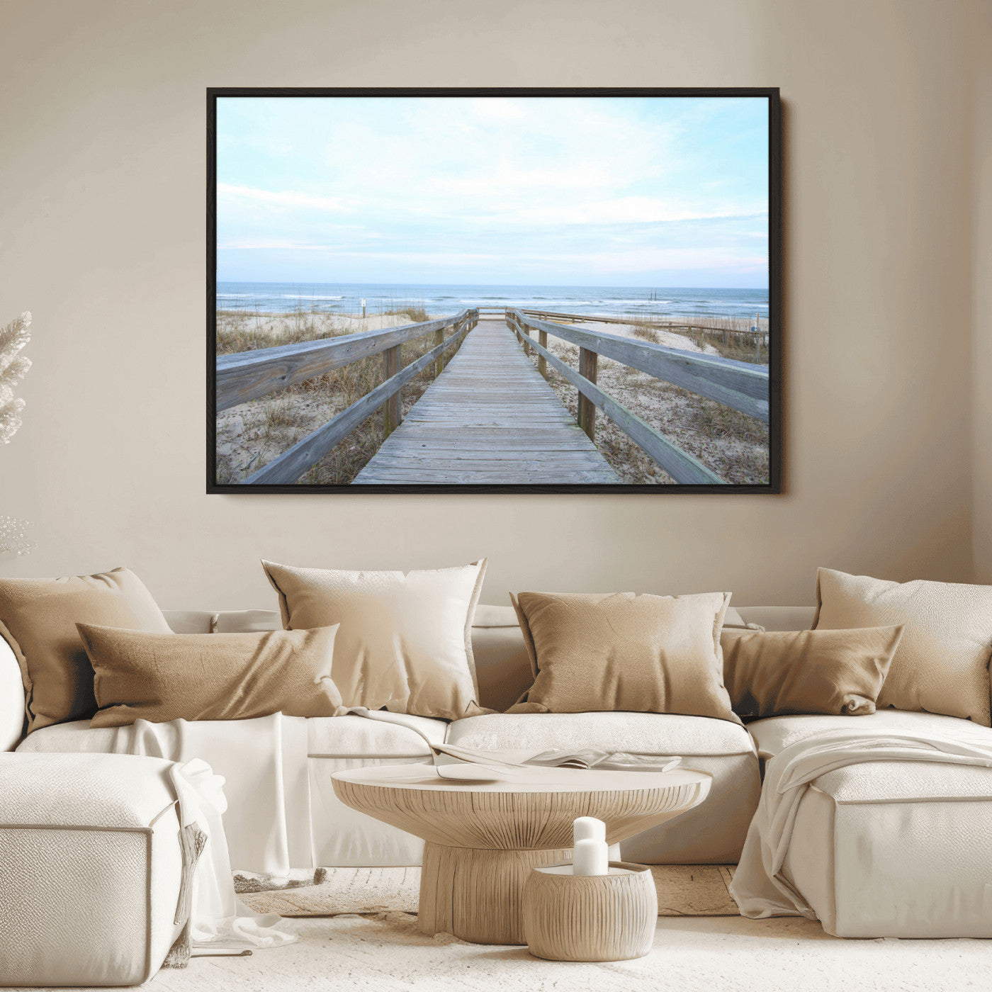 Wooden boardwalk leading to a peaceful beach with gentle ocean waves under a soft pastel sky, perfect for coastal and nautical home decor.