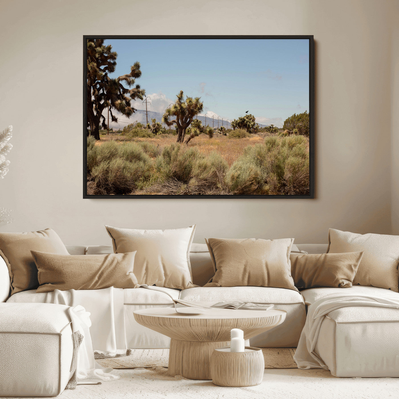 Scenic desert landscape with Joshua trees, dry grass, and distant mountains under a clear blue sky, perfect for southwestern and rustic decor.