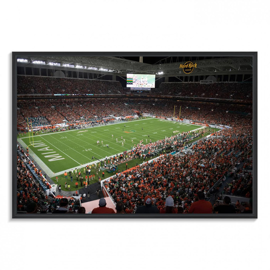 Aerial view of a Miami Hurricanes game at Hard Rock Stadium captured on canvas print, showcasing the teams on the field and fans in the stands.