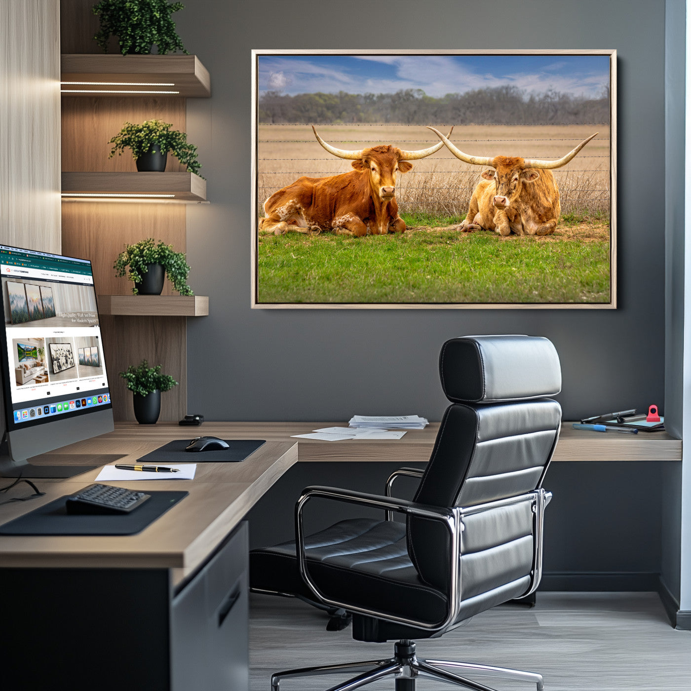 Two longhorn cows lying on green grass in front of a golden field and trees under a blue sky, perfect for rustic country wall decor.