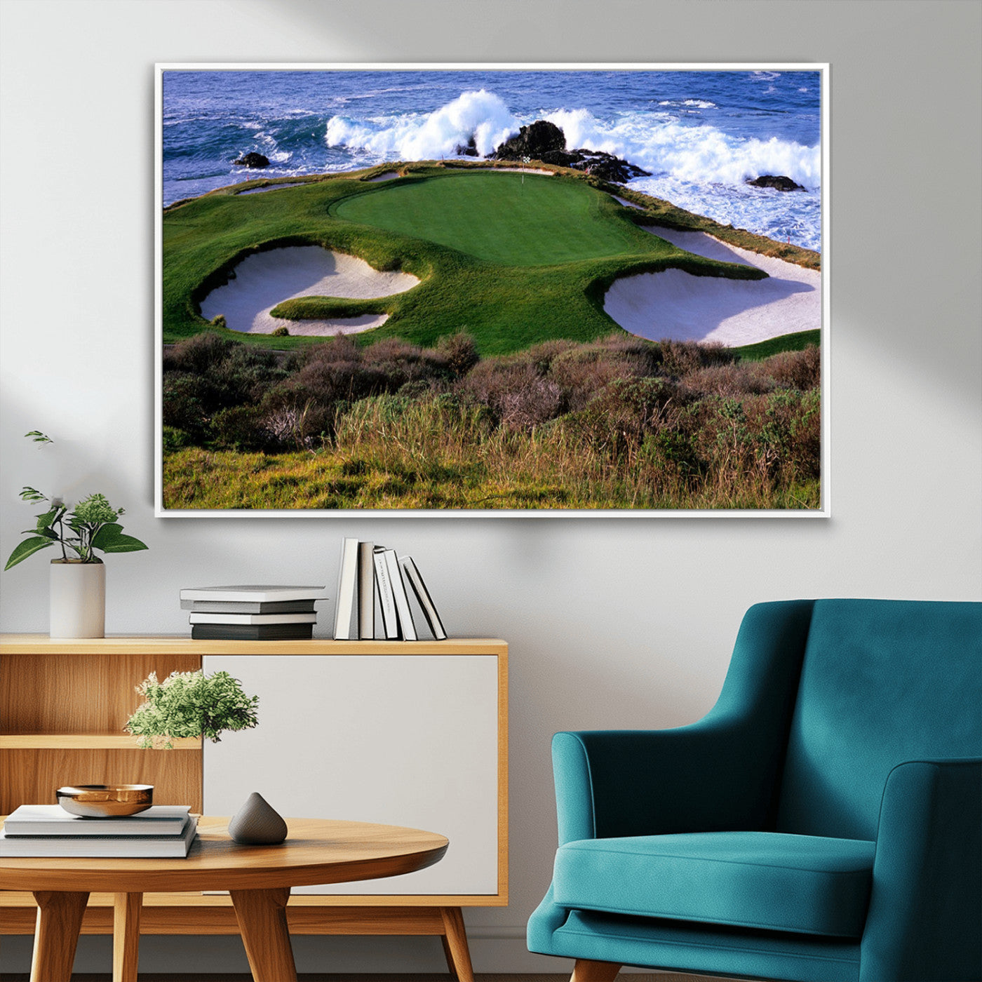 A scenic golf course located by the ocean, featuring a well-manicured green surrounded by sand traps and powerful ocean waves crashing on the shore.