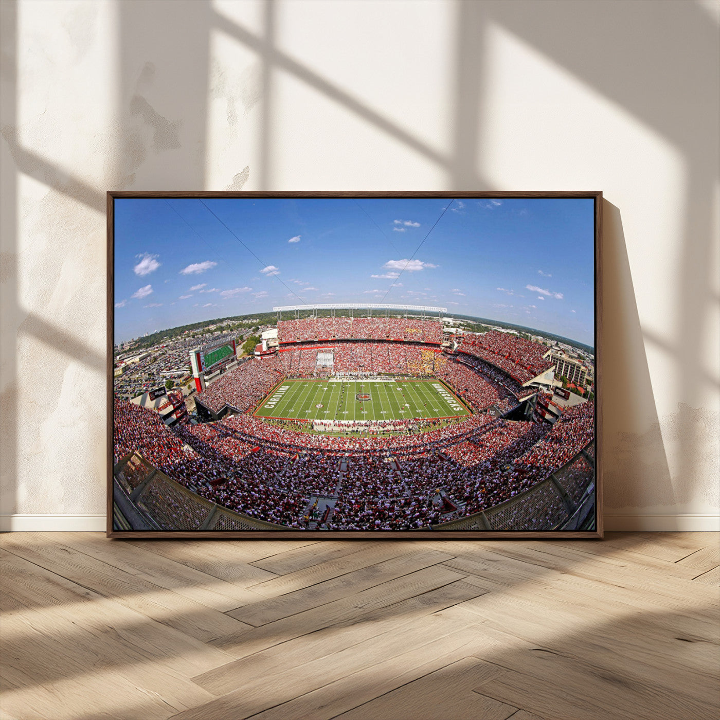 An William Brice-Stadium view of a full football stadium with cheering fans and clear blue skies, capturing the excitement and energy of the game.