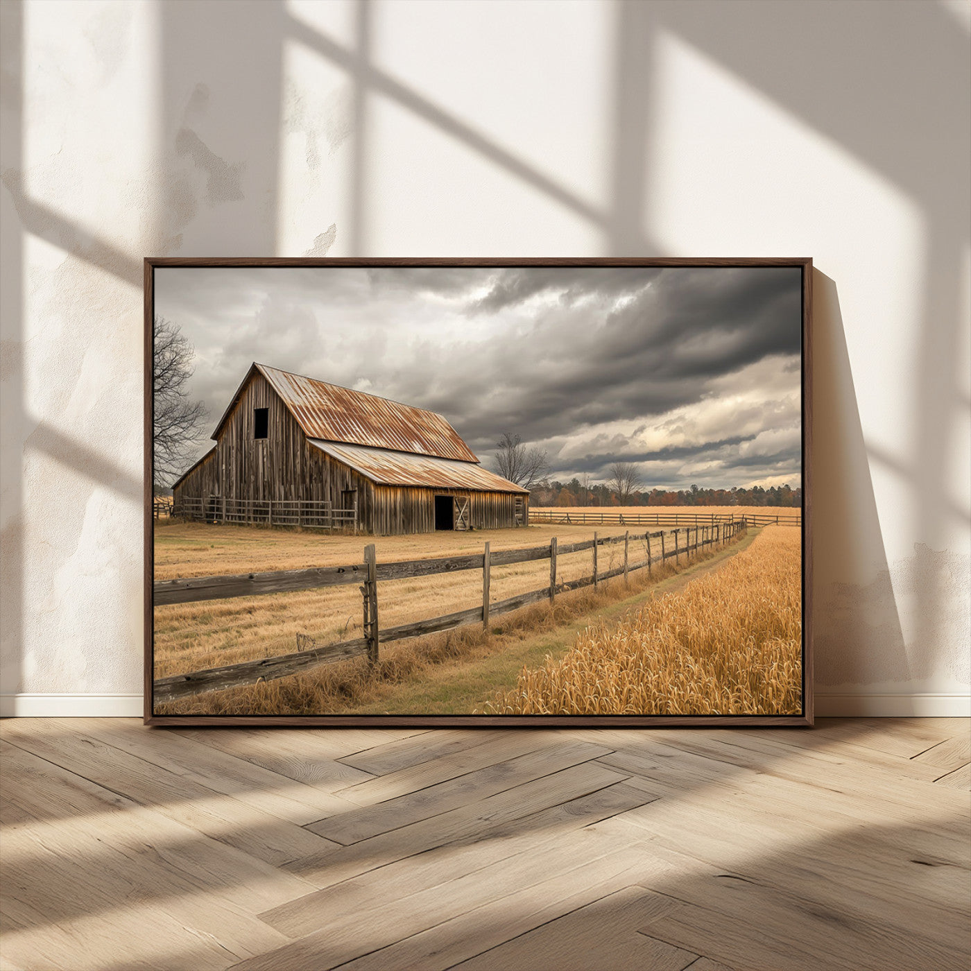 "Rustic barn with a weathered metal roof, surrounded by a wooden fence and golden fields under an overcast sky with dramatic clouds."