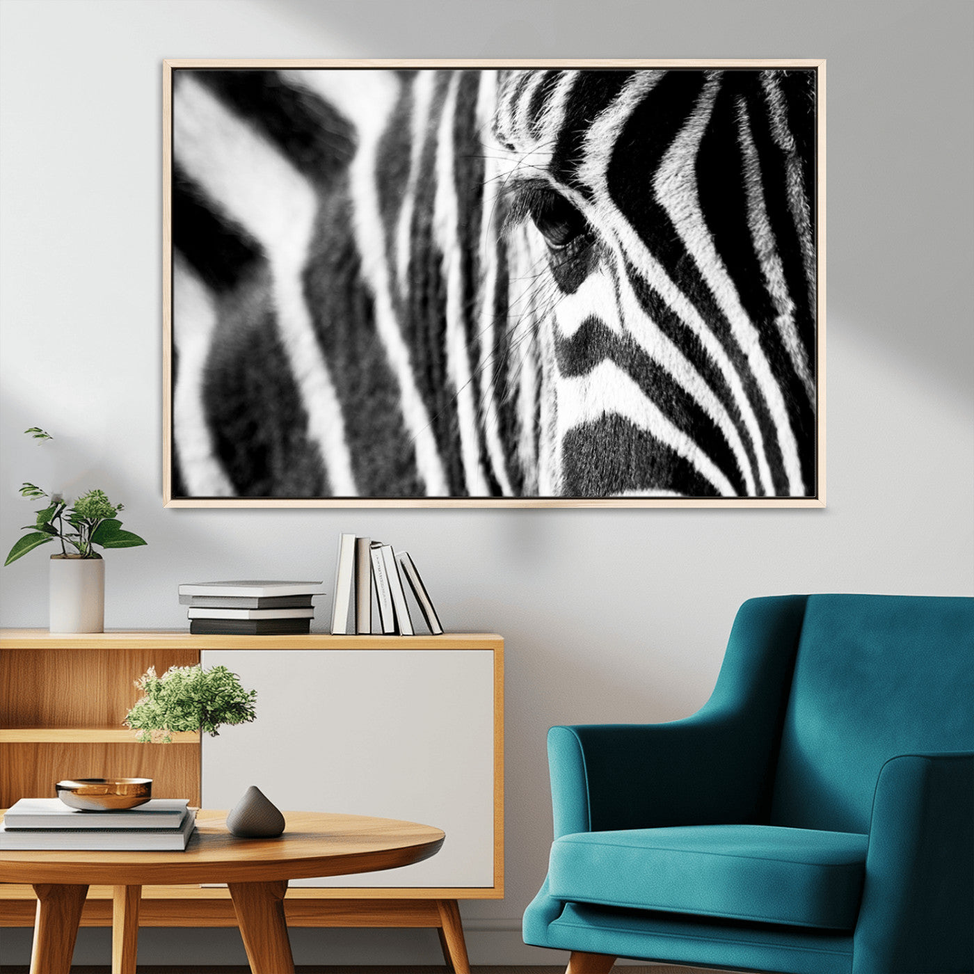 A close-up black and white photograph of a zebra's eye, showcasing the intricate patterns of its stripes in sharp detail.