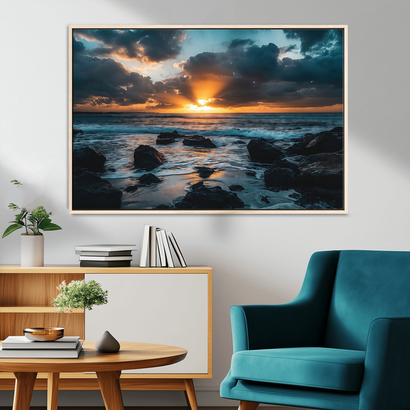 An awe-inspiring sunset over the ocean with rays of light piercing through dramatic clouds, creating a beautiful seascape with rocks in the foreground.