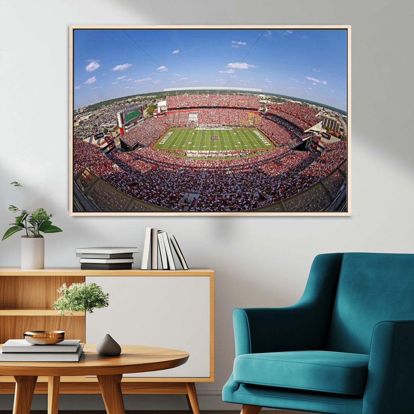 An William Brice-Stadium view of a full football stadium with cheering fans and clear blue skies, capturing the excitement and energy of the game.