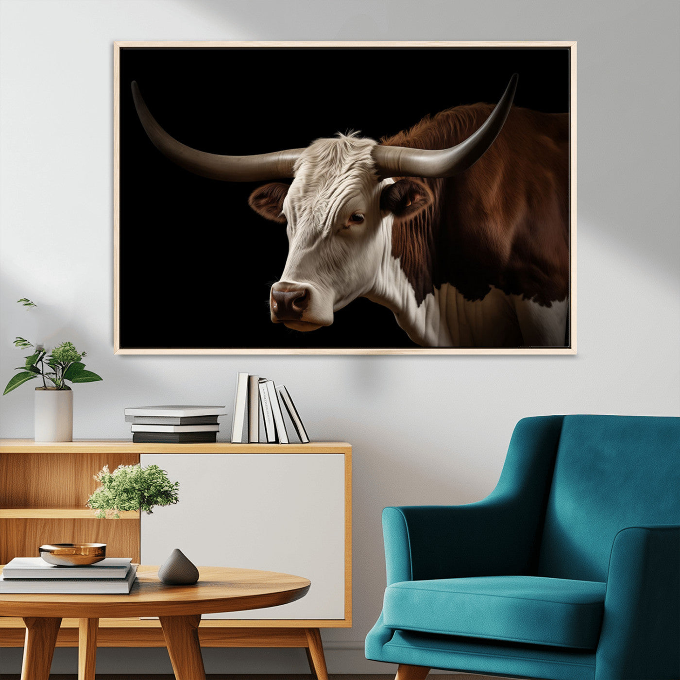 "Close-up of a brown and white longhorn cow with prominent curved horns against a black background."