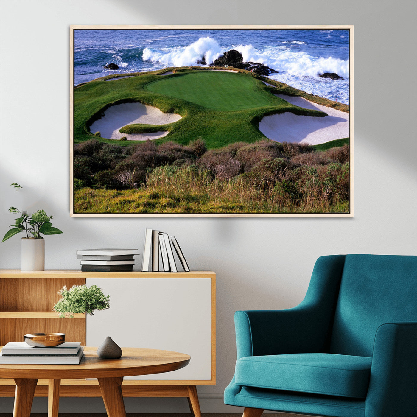 A scenic golf course located by the ocean, featuring a well-manicured green surrounded by sand traps and powerful ocean waves crashing on the shore.