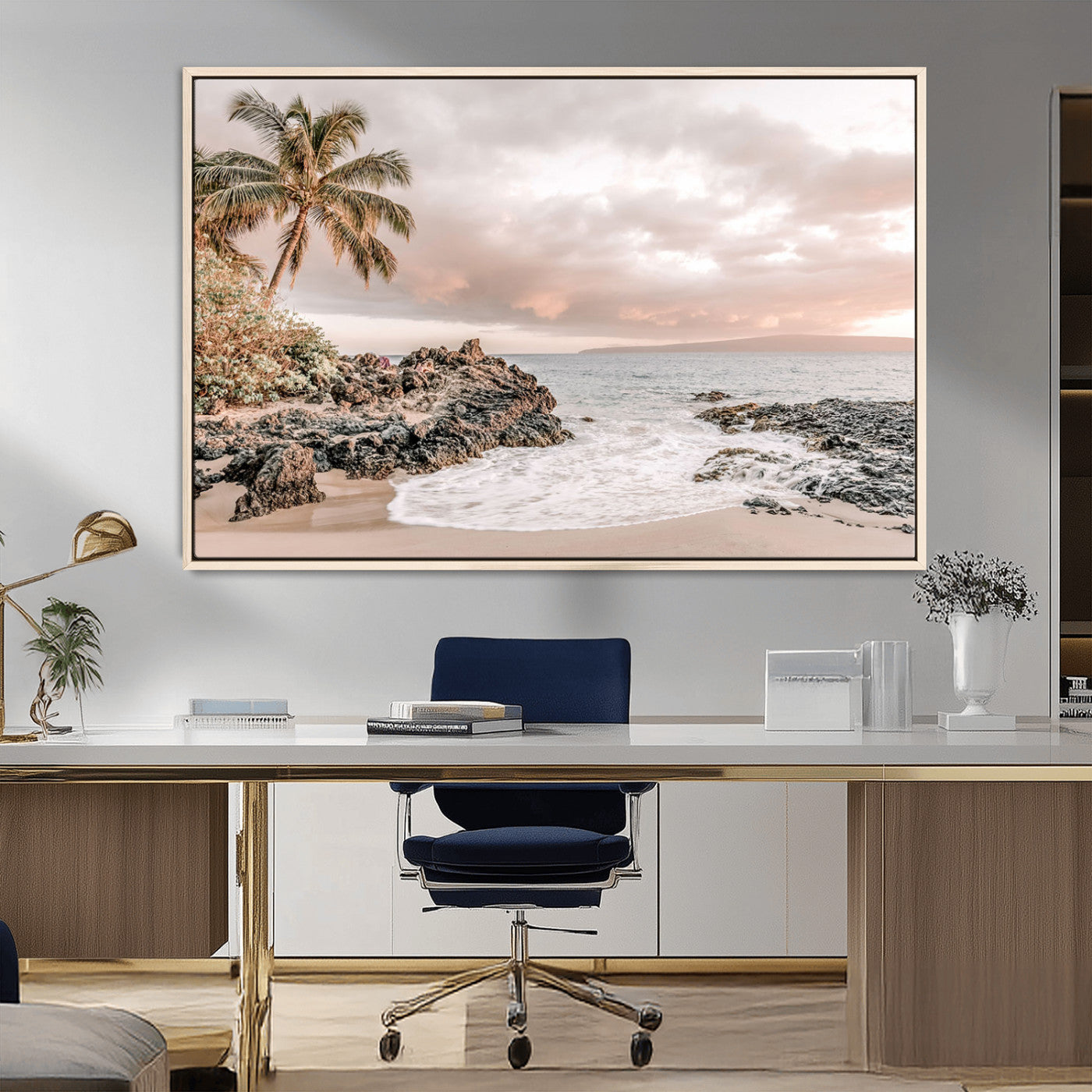 A peaceful beach scene with a palm tree and rocks, soft waves washing onto the shore under a soft pastel sky at sunset.