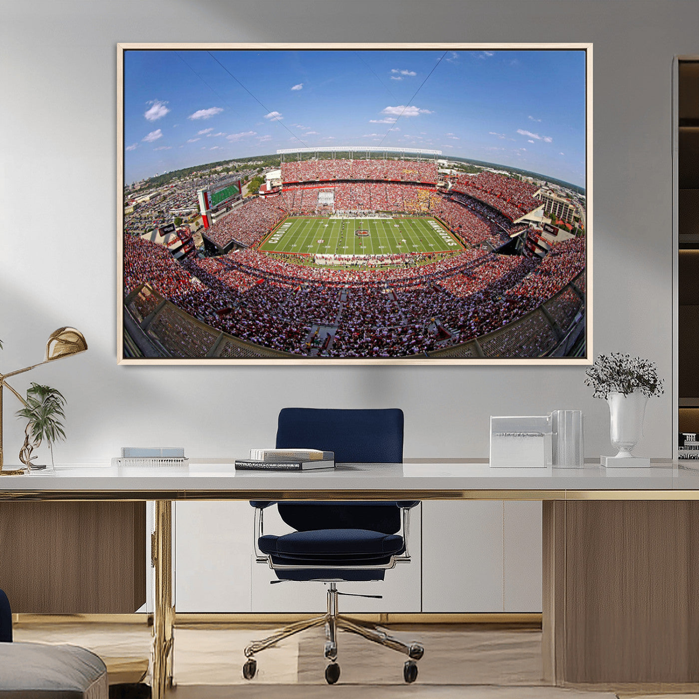 An William Brice-Stadium view of a full football stadium with cheering fans and clear blue skies, capturing the excitement and energy of the game.