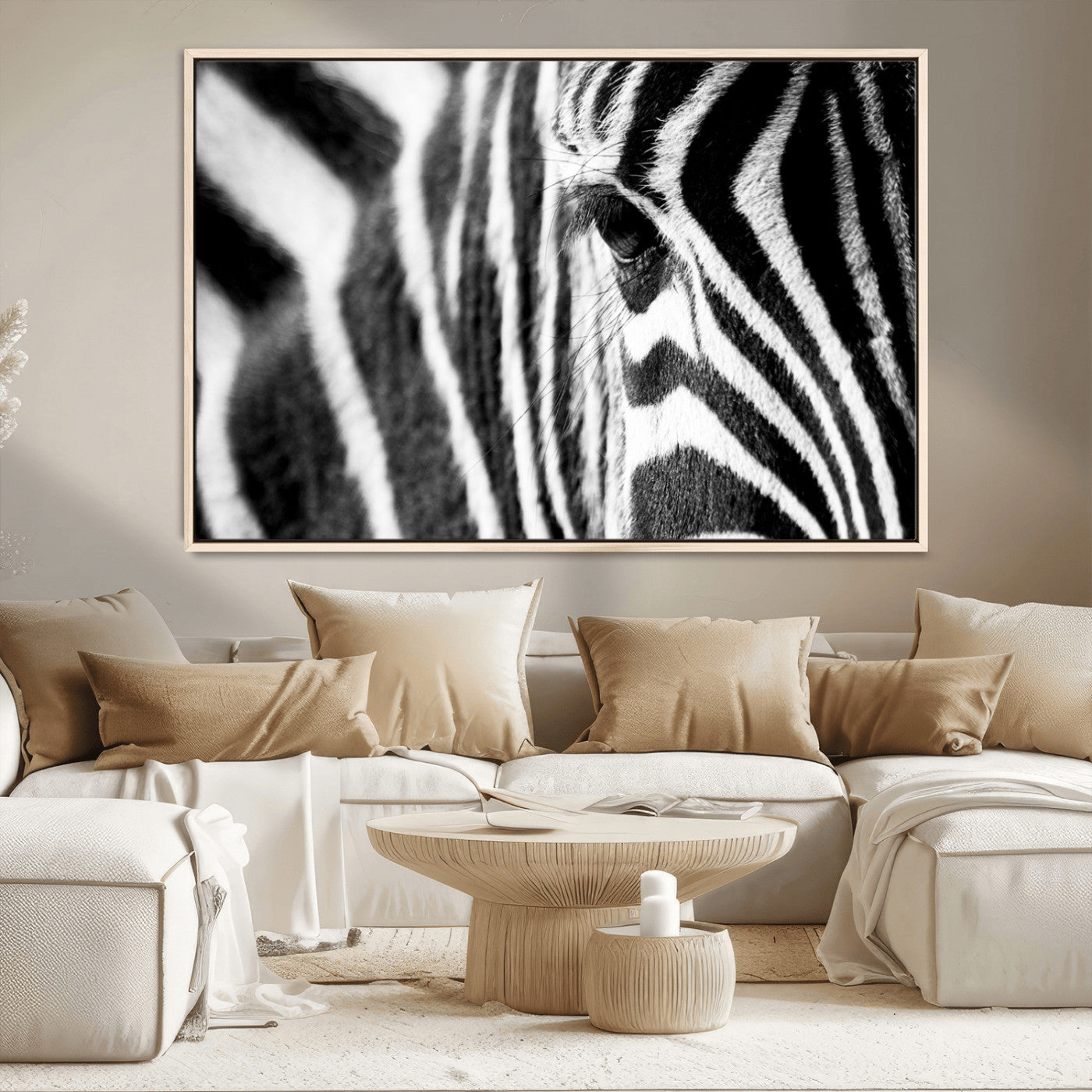 A close-up black and white photograph of a zebra's eye, showcasing the intricate patterns of its stripes in sharp detail.