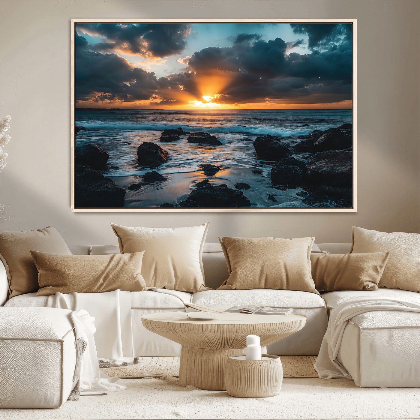 An awe-inspiring sunset over the ocean with rays of light piercing through dramatic clouds, creating a beautiful seascape with rocks in the foreground.