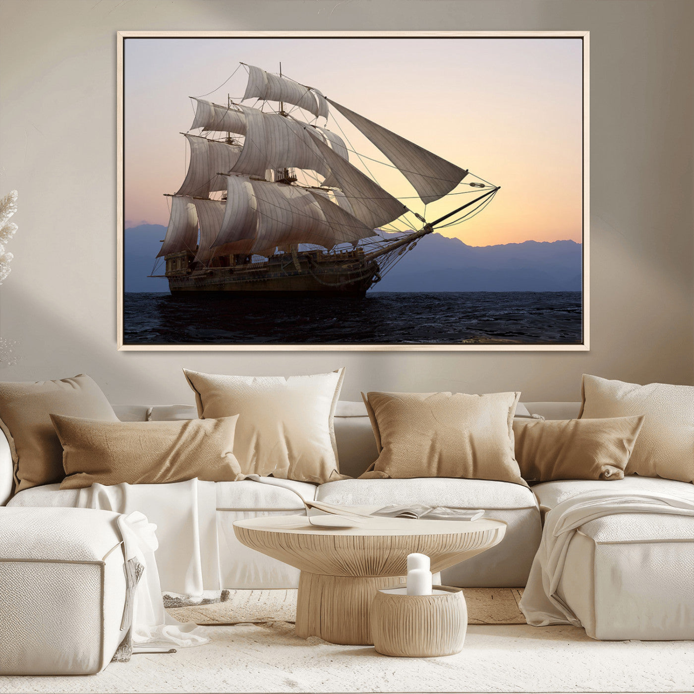 Majestic tall ship with full sails gliding across the ocean at sunset, with mountain silhouettes in the background – Wall Art Canvas Print.