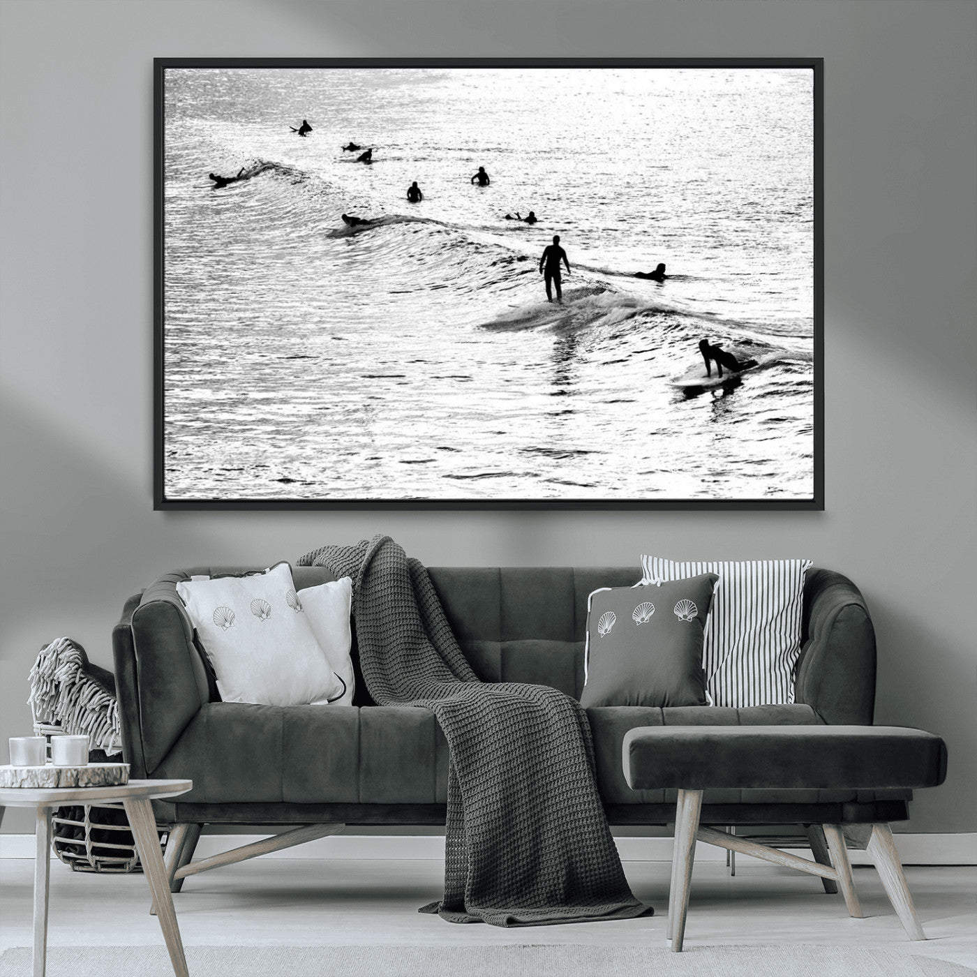 19970637-MGV-CV-36X24-Black and white artistic view of surfers riding and paddling on waves in the ocean, capturing the dynamic motion and energy of surfing