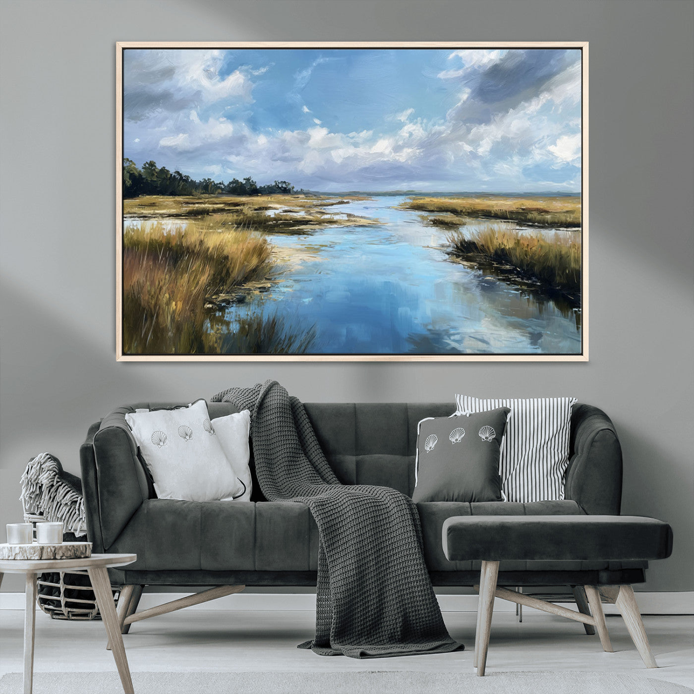 A beautiful, painterly landscape of a calm river winding through a marsh, with vibrant green grasses and a bright blue sky filled with fluffy clouds.