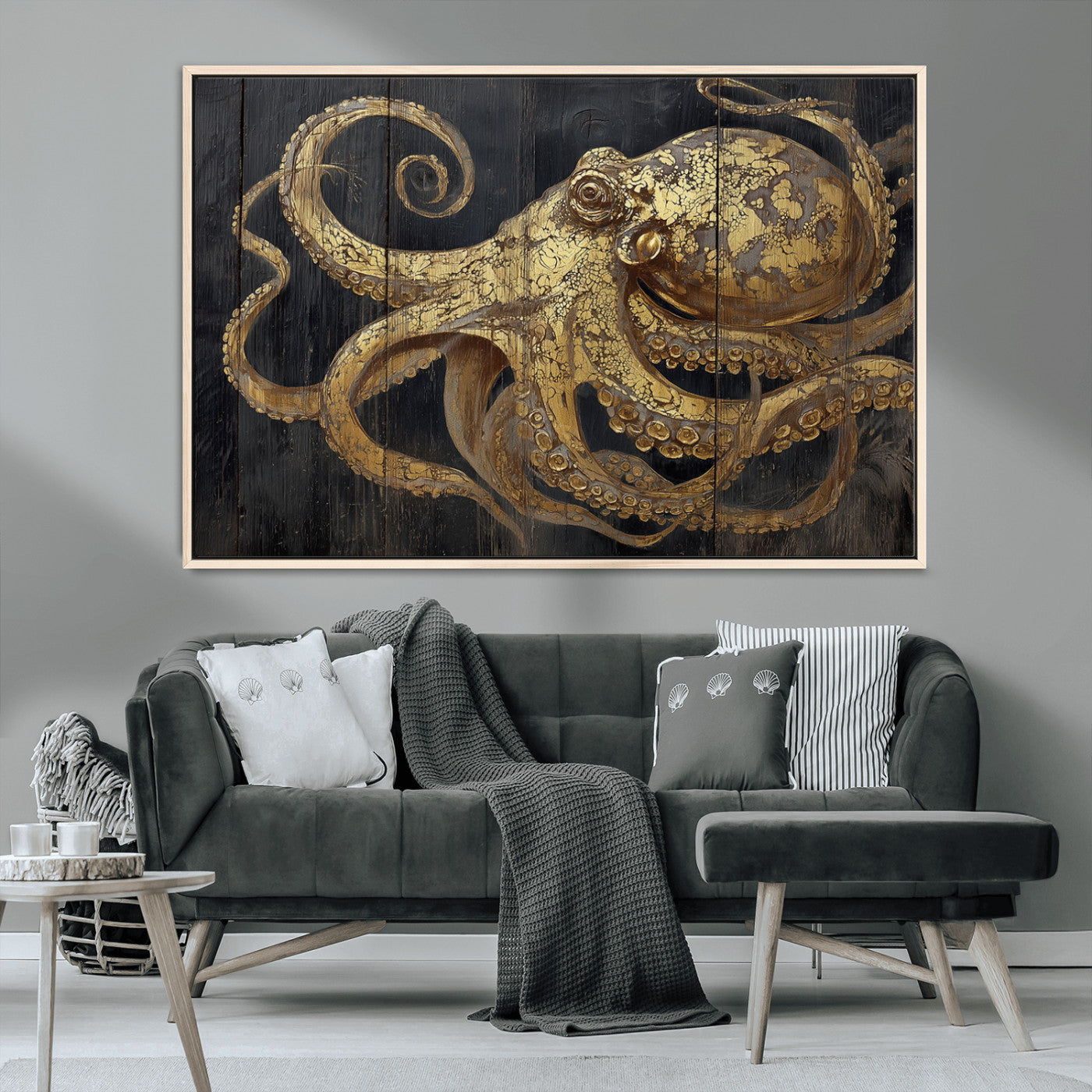 A detailed gold illustration of an octopus on black wooden planks, showing its intricate tentacles and textured skin in an artistic style.