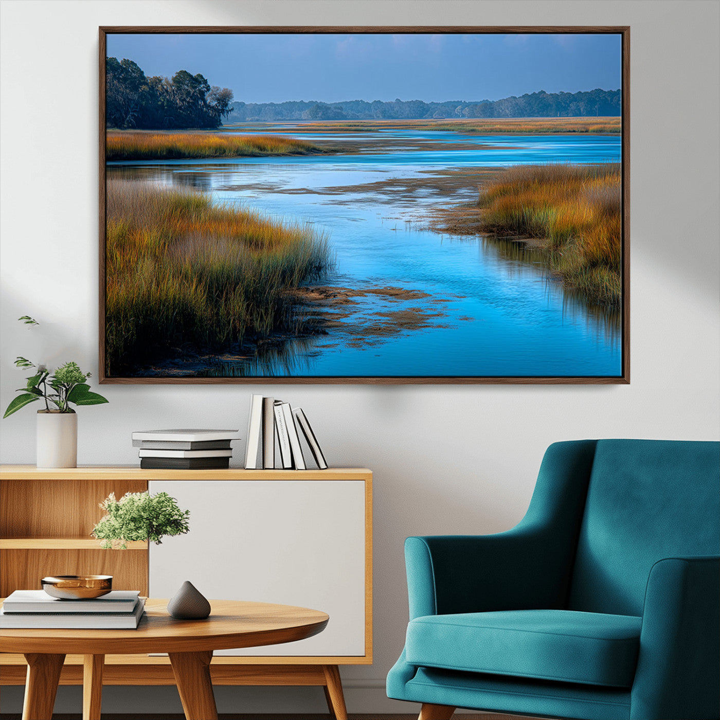 A peaceful marshland scene with calm blue water reflecting the surrounding grasses and trees, capturing the beauty of nature in a serene landscape.