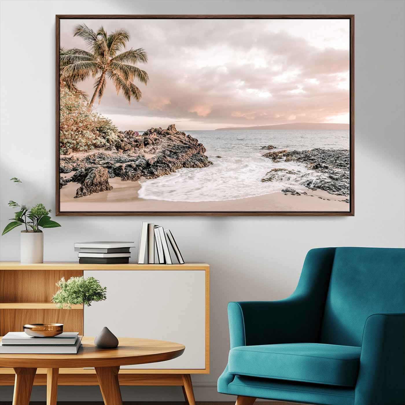 A peaceful beach scene with a palm tree and rocks, soft waves washing onto the shore under a soft pastel sky at sunset.