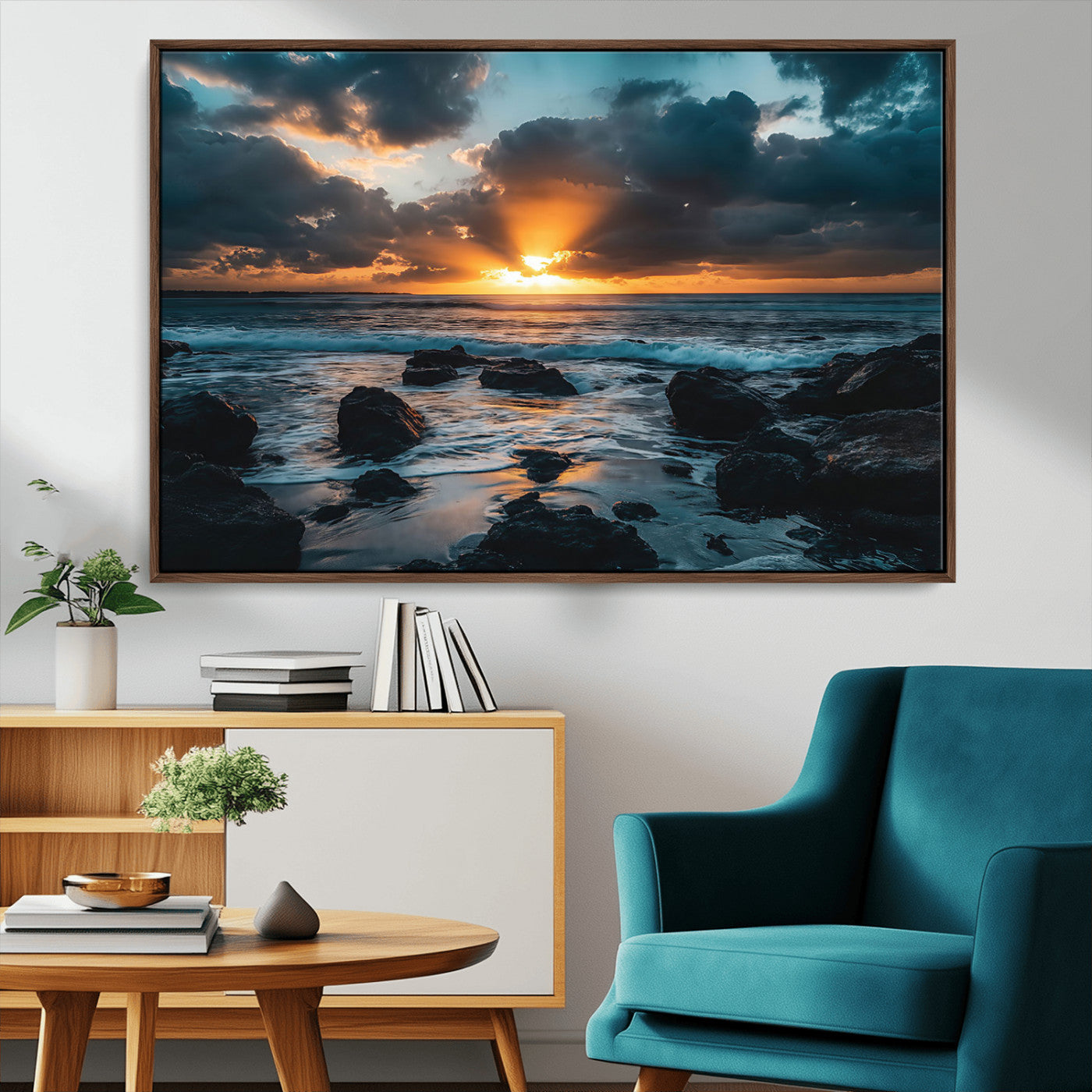 An awe-inspiring sunset over the ocean with rays of light piercing through dramatic clouds, creating a beautiful seascape with rocks in the foreground.