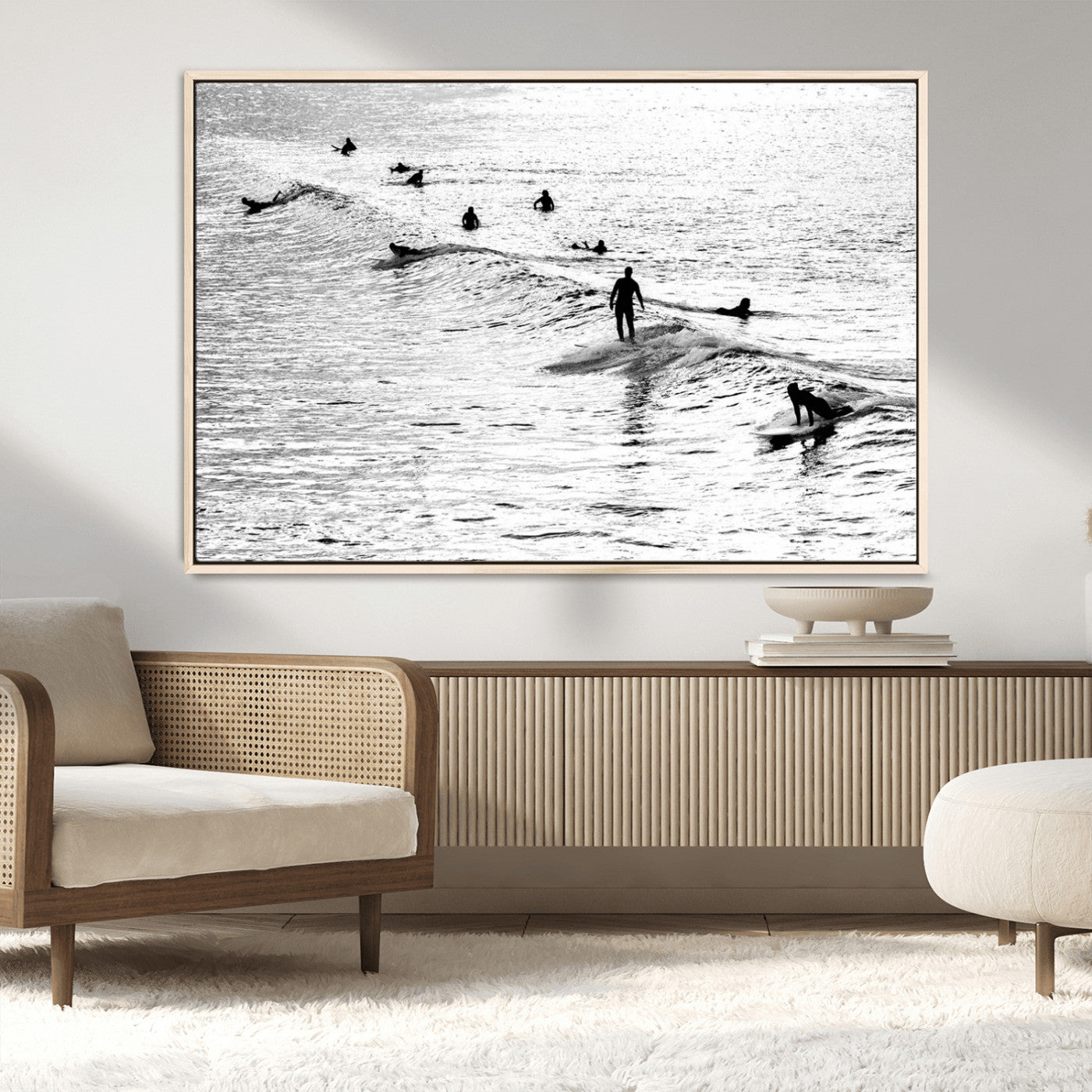 19970637-MGV-CV-36X24-Black and white artistic view of surfers riding and paddling on waves in the ocean, capturing the dynamic motion and energy of surfing