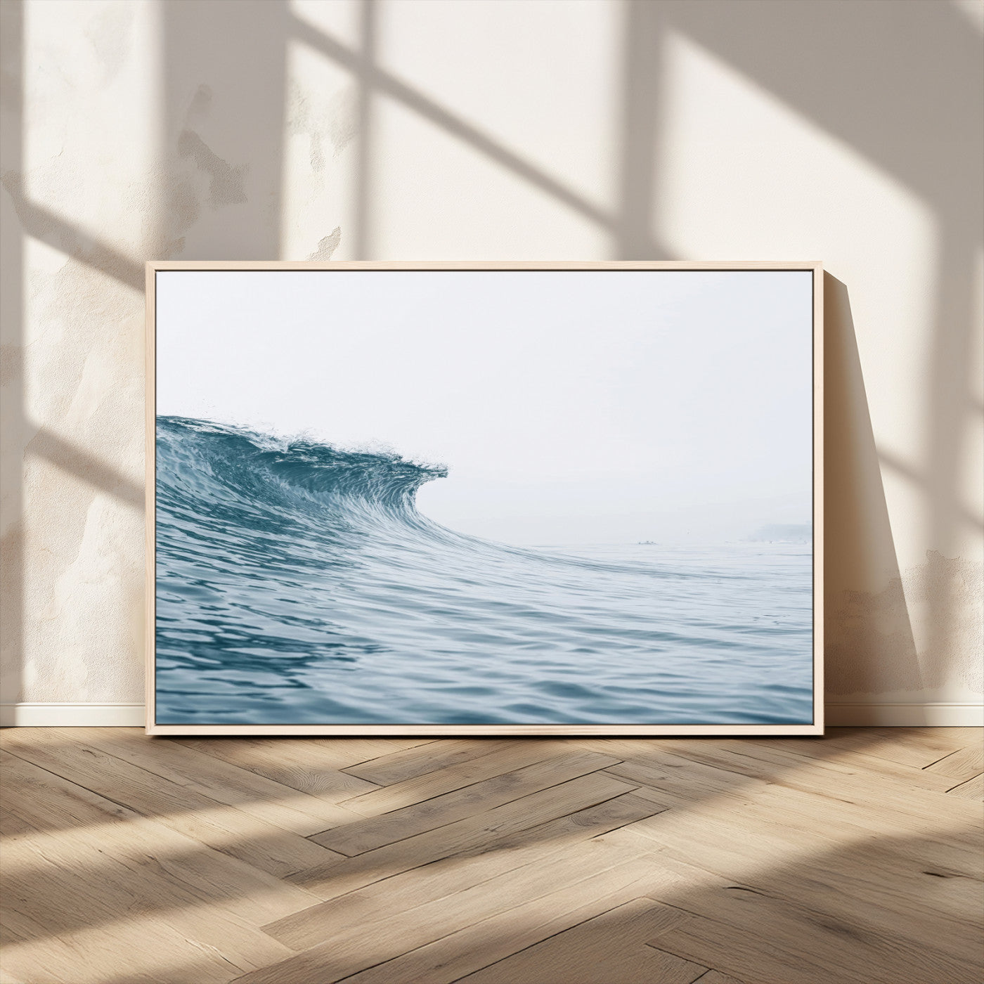A single ocean wave curling in soft blue tones under a misty sky, ideal for coastal or minimalist home wall decor.