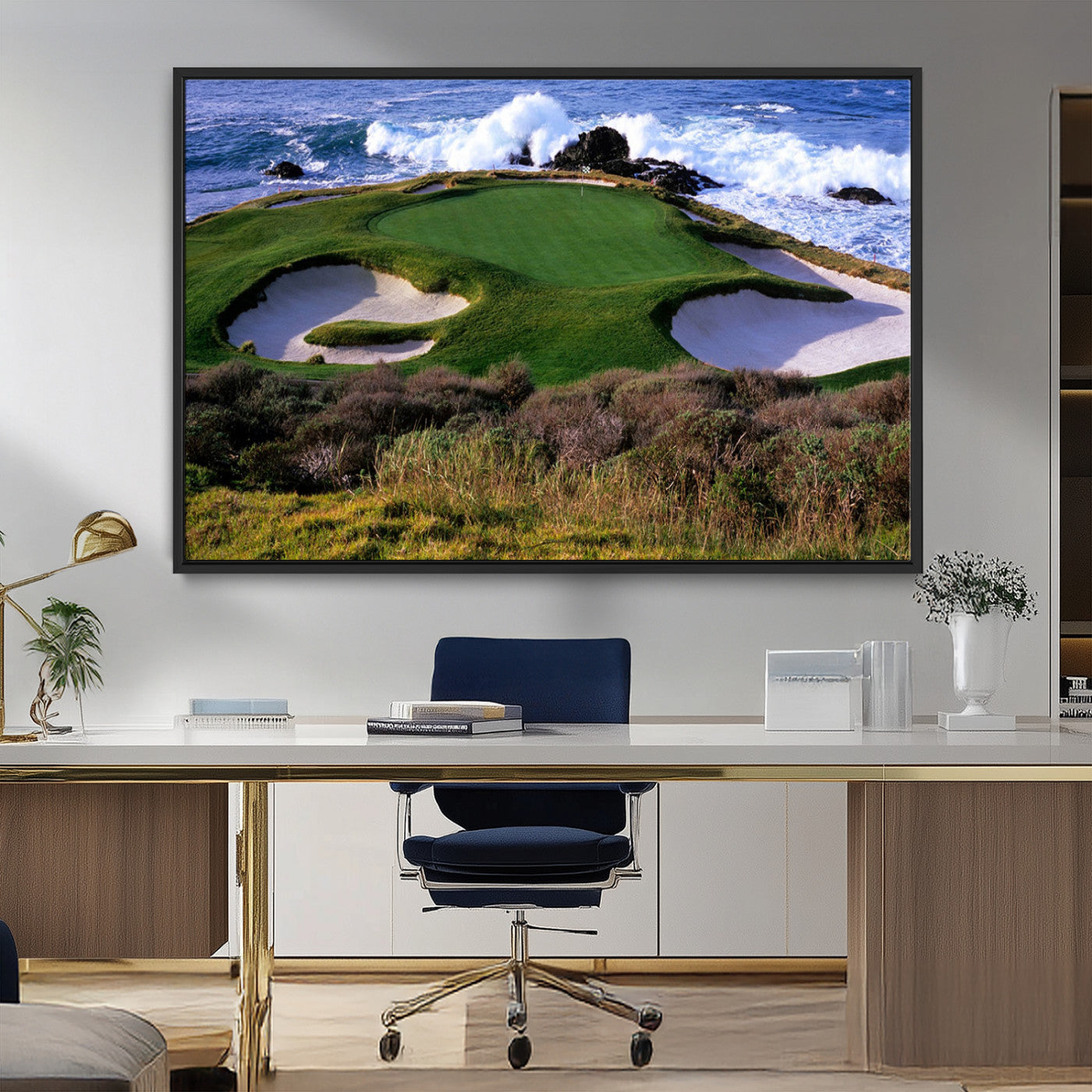 A scenic golf course located by the ocean, featuring a well-manicured green surrounded by sand traps and powerful ocean waves crashing on the shore.