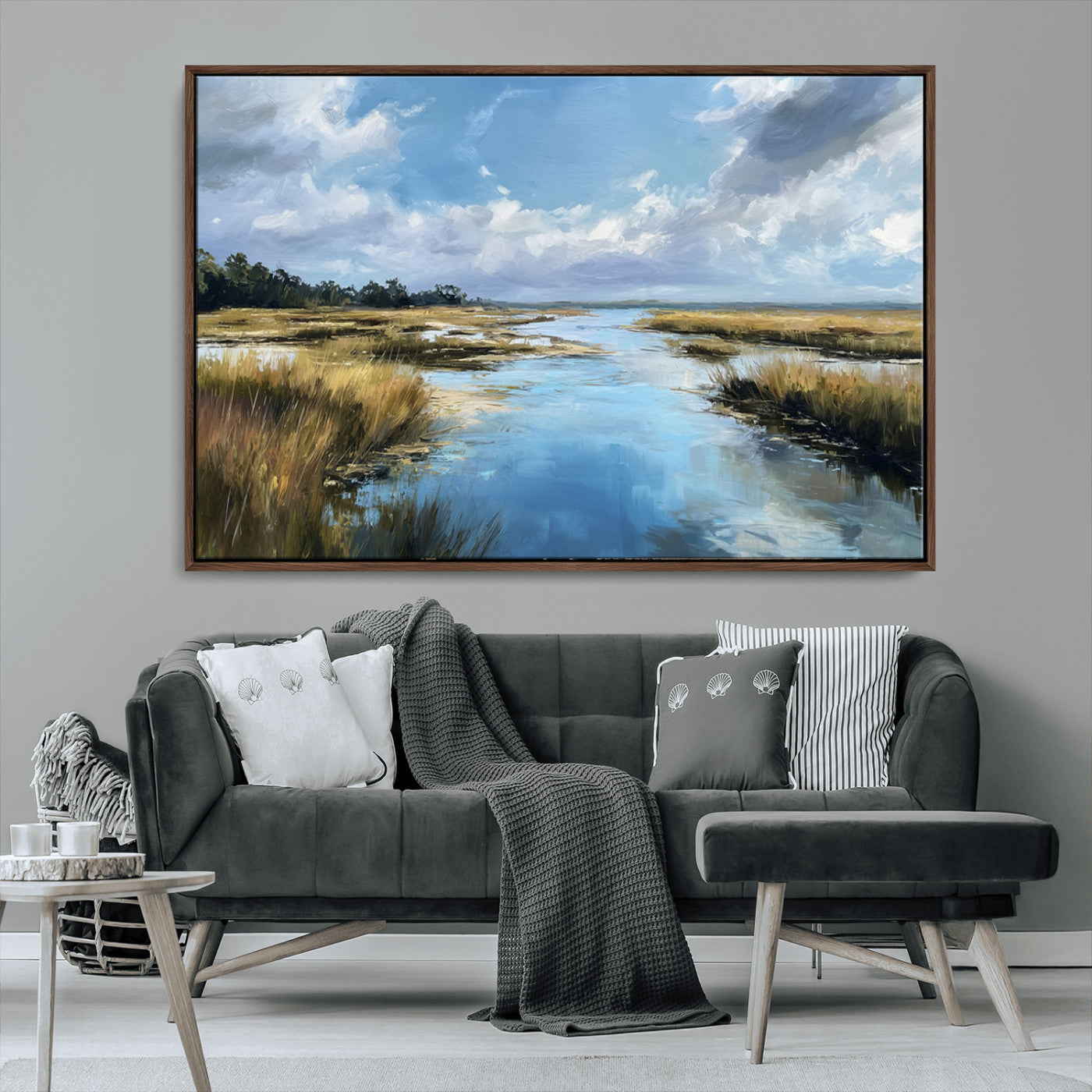 A beautiful, painterly landscape of a calm river winding through a marsh, with vibrant green grasses and a bright blue sky filled with fluffy clouds.