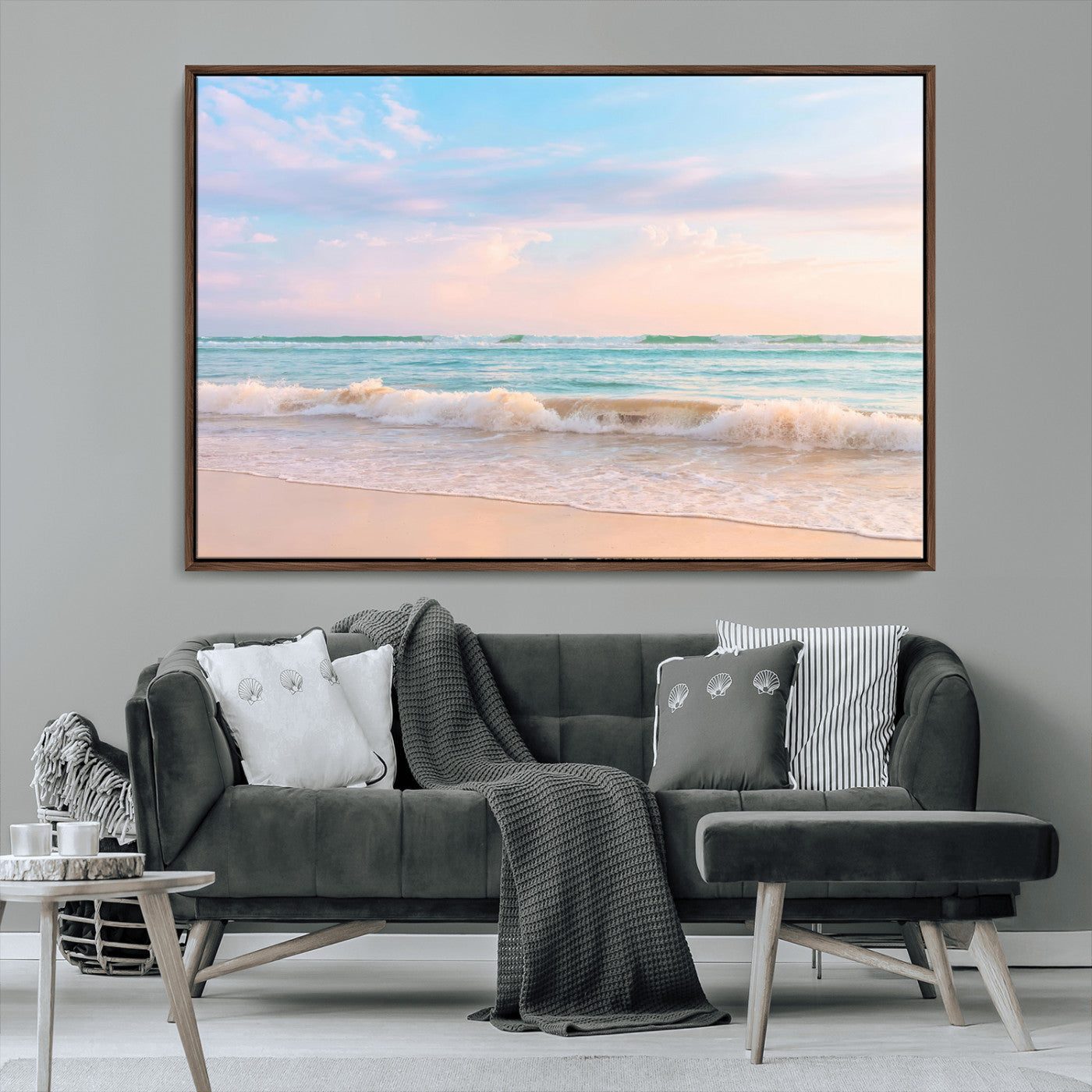 A peaceful beach scene with soft pastel skies, gentle waves washing up on the sandy shore, creating a calm and serene ocean view.
