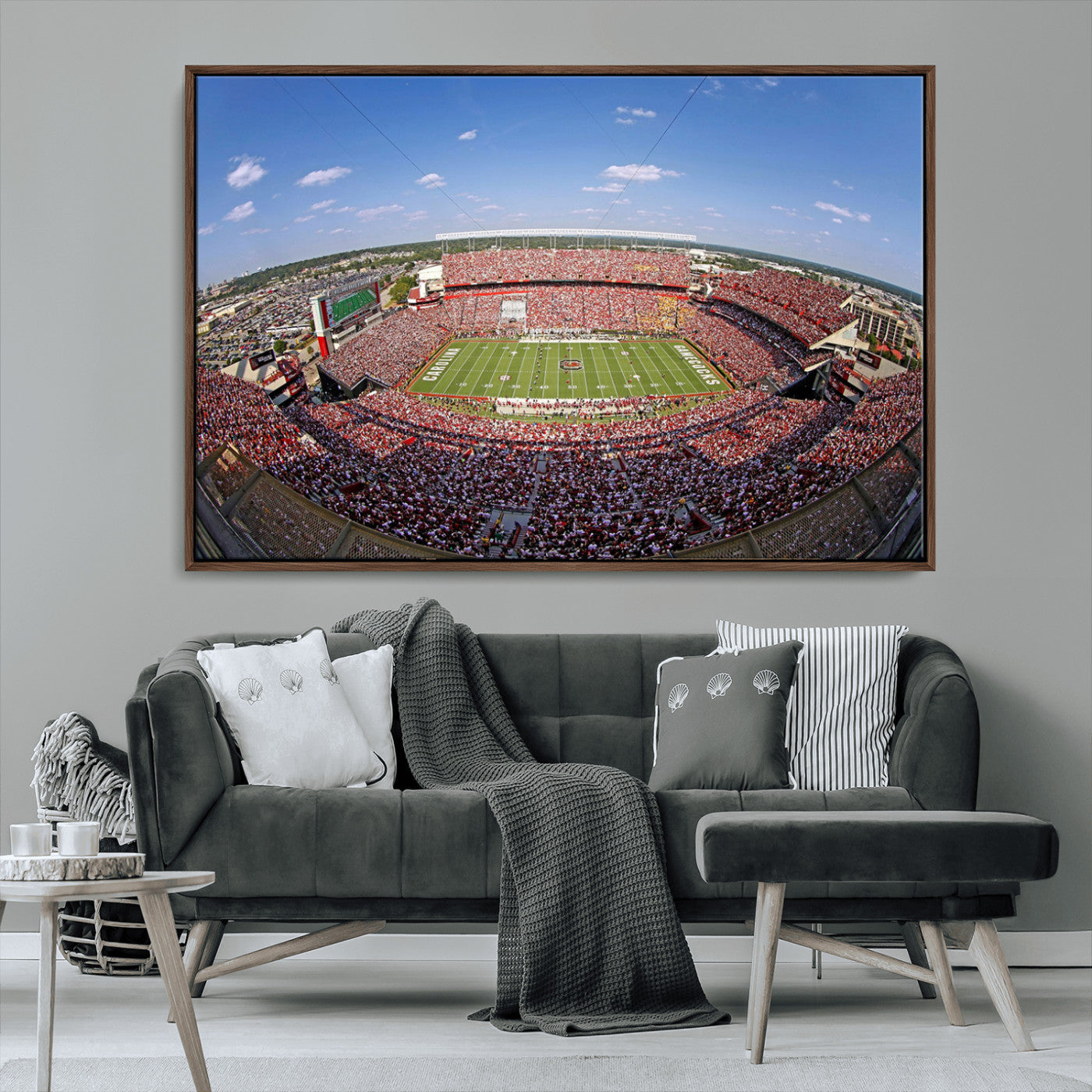 An William Brice-Stadium view of a full football stadium with cheering fans and clear blue skies, capturing the excitement and energy of the game.