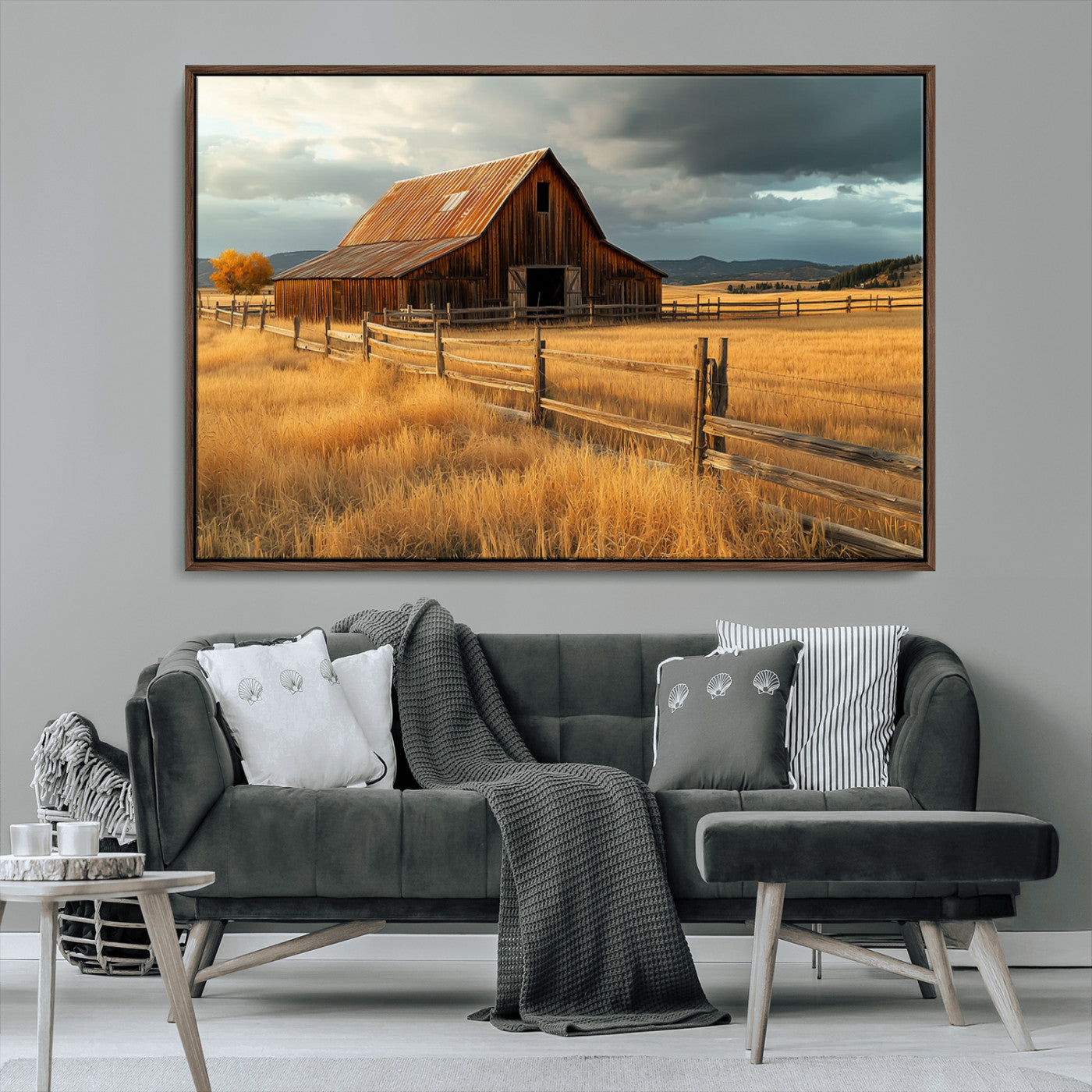 "Golden fields surrounding a rustic barn with a weathered roof, a wooden fence, and dramatic skies with sunlight breaking through the clouds."