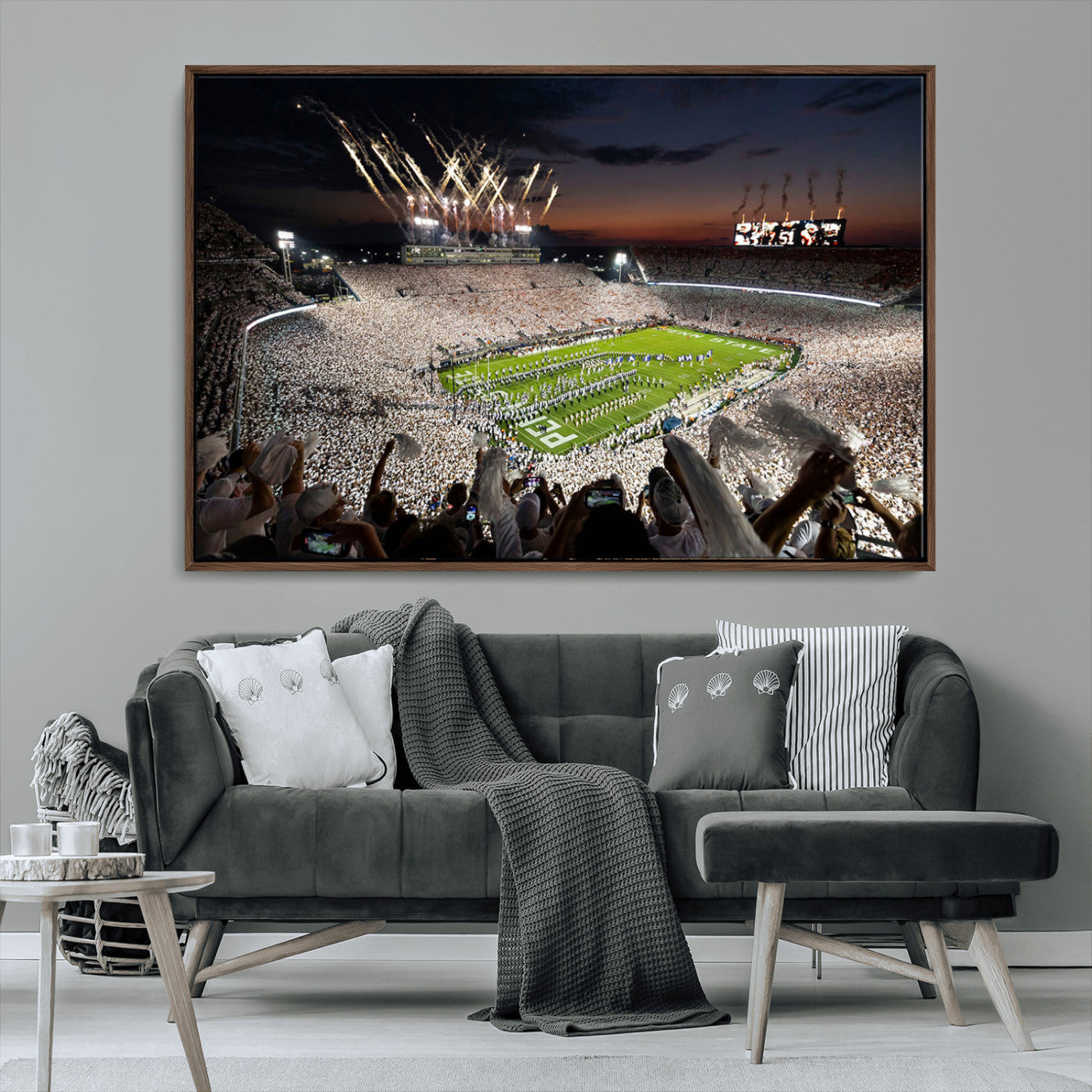 Panoramic view of a packed football stadium during a night game with a firework display and marching band performance – Wall Art Canvas Print.