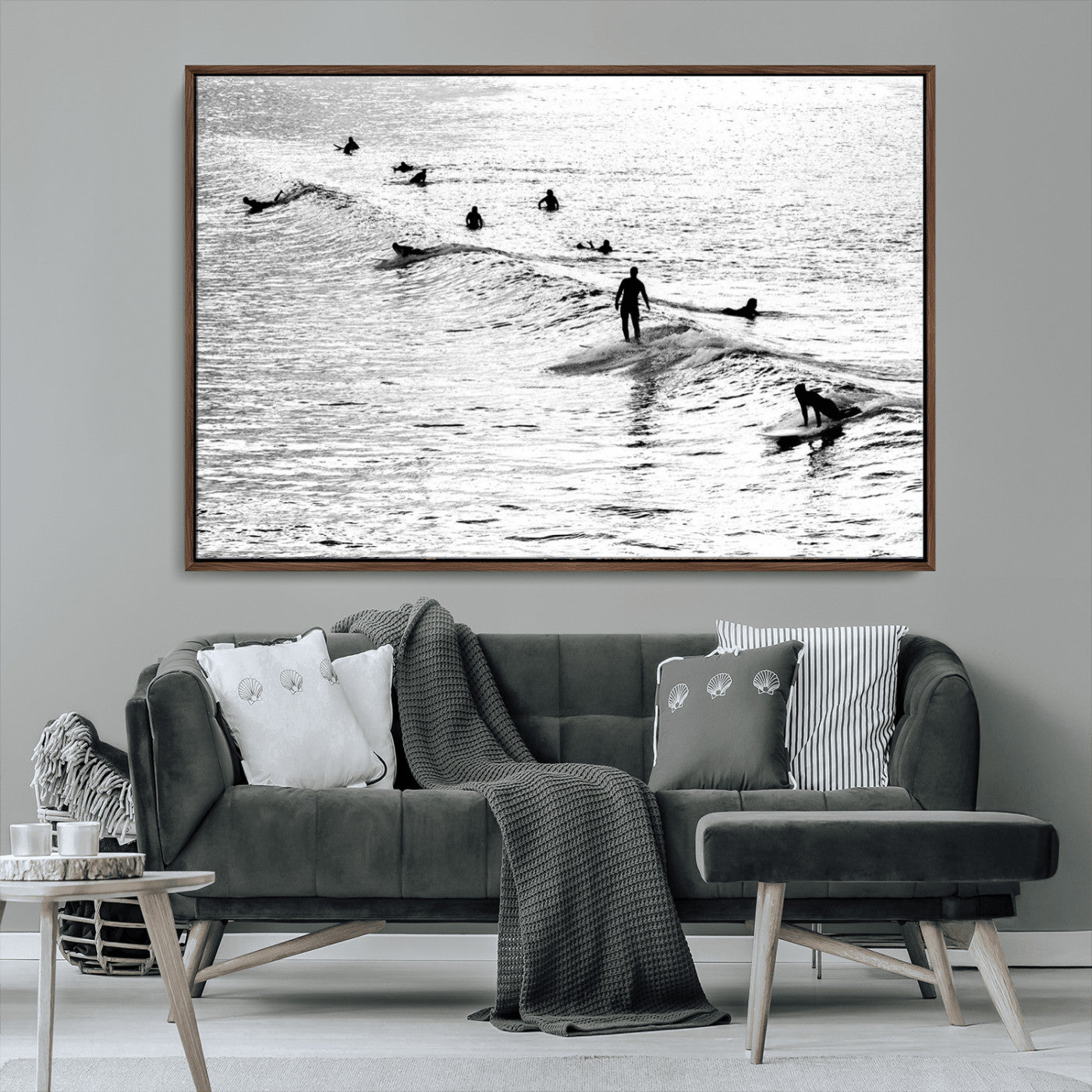 19970637-MGV-CV-36X24-Black and white artistic view of surfers riding and paddling on waves in the ocean, capturing the dynamic motion and energy of surfing