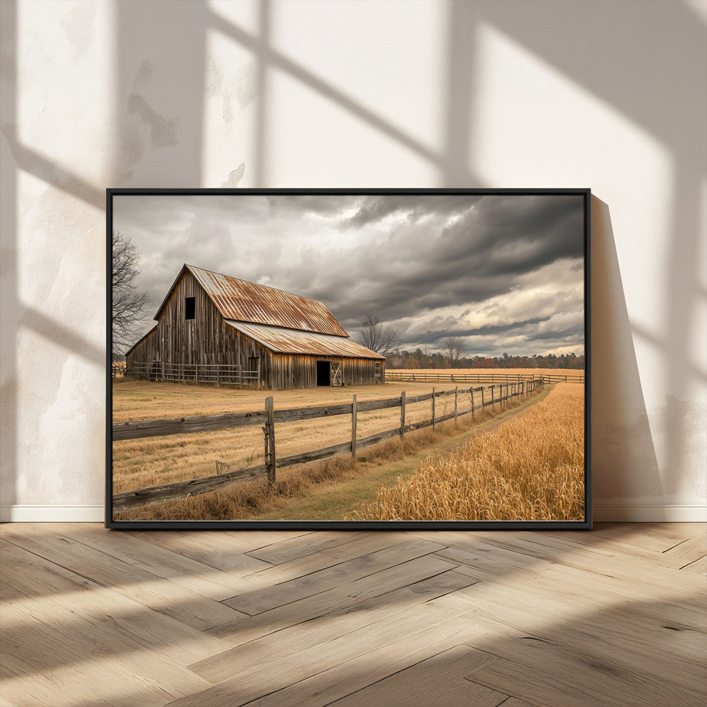 "Rustic barn with a weathered metal roof, surrounded by a wooden fence and golden fields under an overcast sky with dramatic clouds."