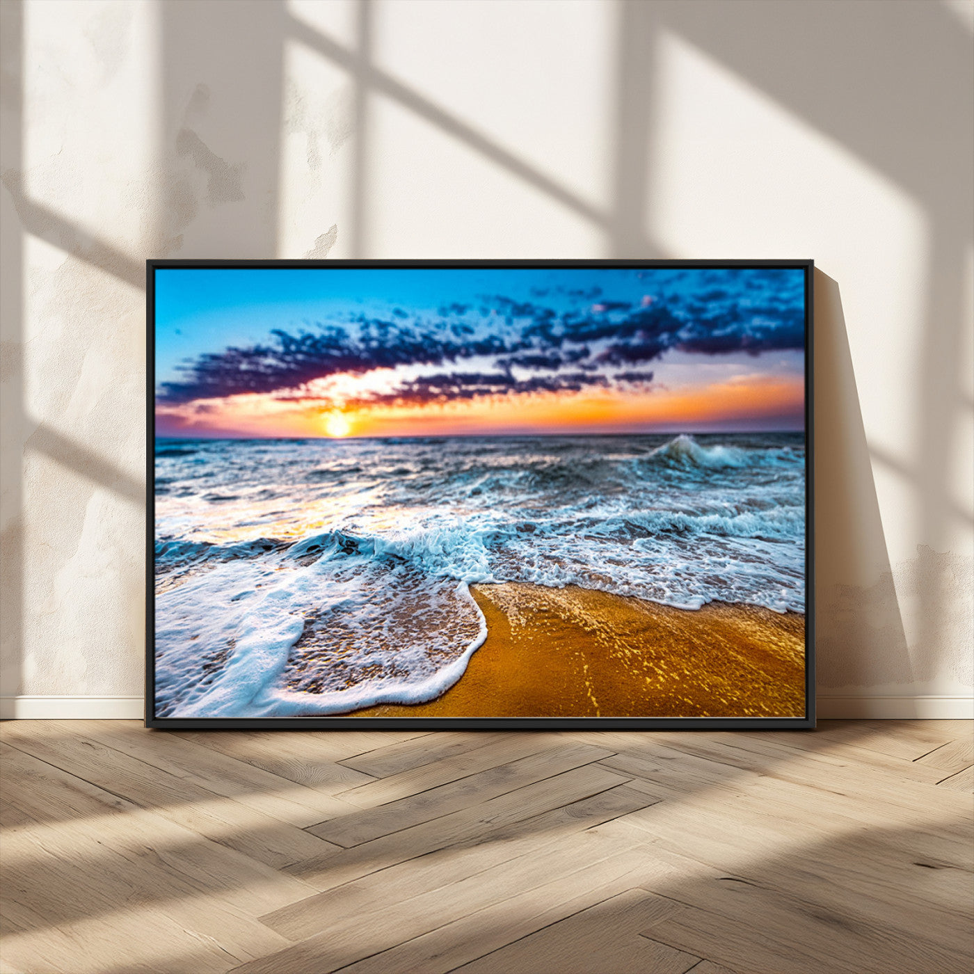 Beautiful ocean shoreline at sunset with foamy waves washing onto golden sand under a colorful sky – Wall Art Canvas Print.