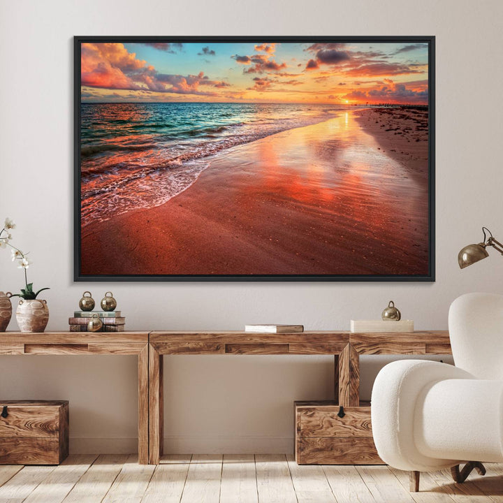 A Vibrant Sunset Beach Canvas Print with ocean waves and sandy shoreline enhances coastal-themed interiors.