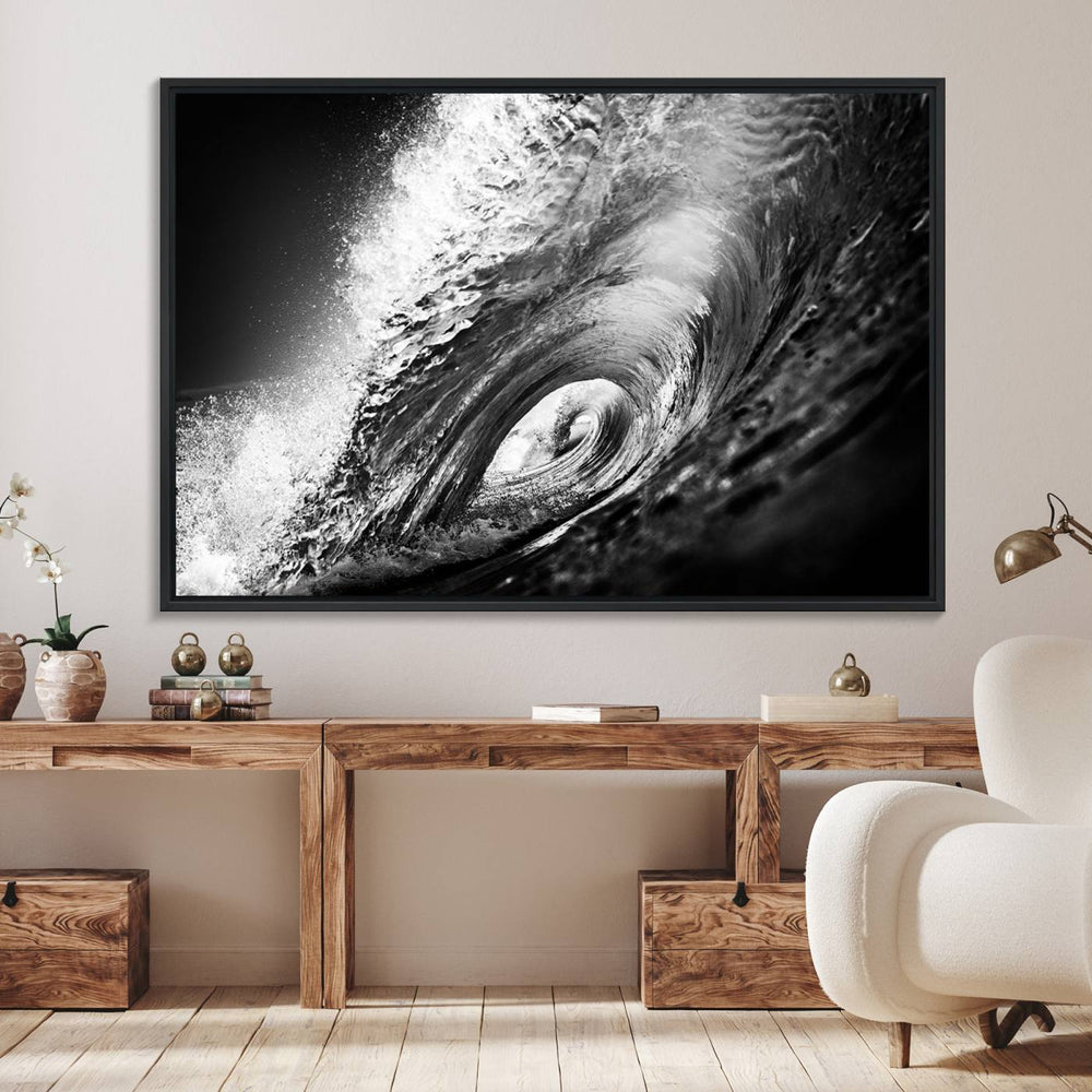 The Black Ocean Wave at Sunset Canvas Art hangs on a grey wooden wall.